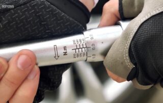 How should Audi Q7 wheel spacers be torqued to?