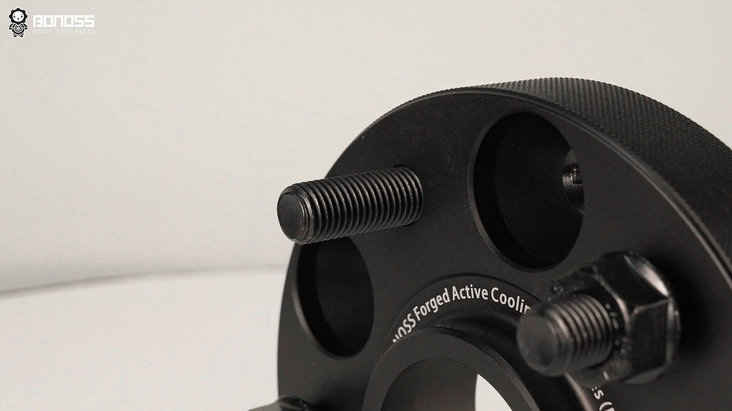 Installing Tesla Model S Spacers Follow this 7-Step DIY Guide BONOSS Forged Active Cooling Adapters Hubcentric Spacers Pros Before and After Example (1)