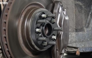 Are Tesla Model S Wheel Spacers Worth It A Full Breakdown BONOSS Forged Active Cooling Adapters Hubcentric Spacers Pros Before and After Example (1)