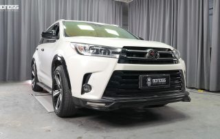 2018 Toyota Highlander with 35mm BONOSS wheel spacers installed showing flush wide stance after body kit