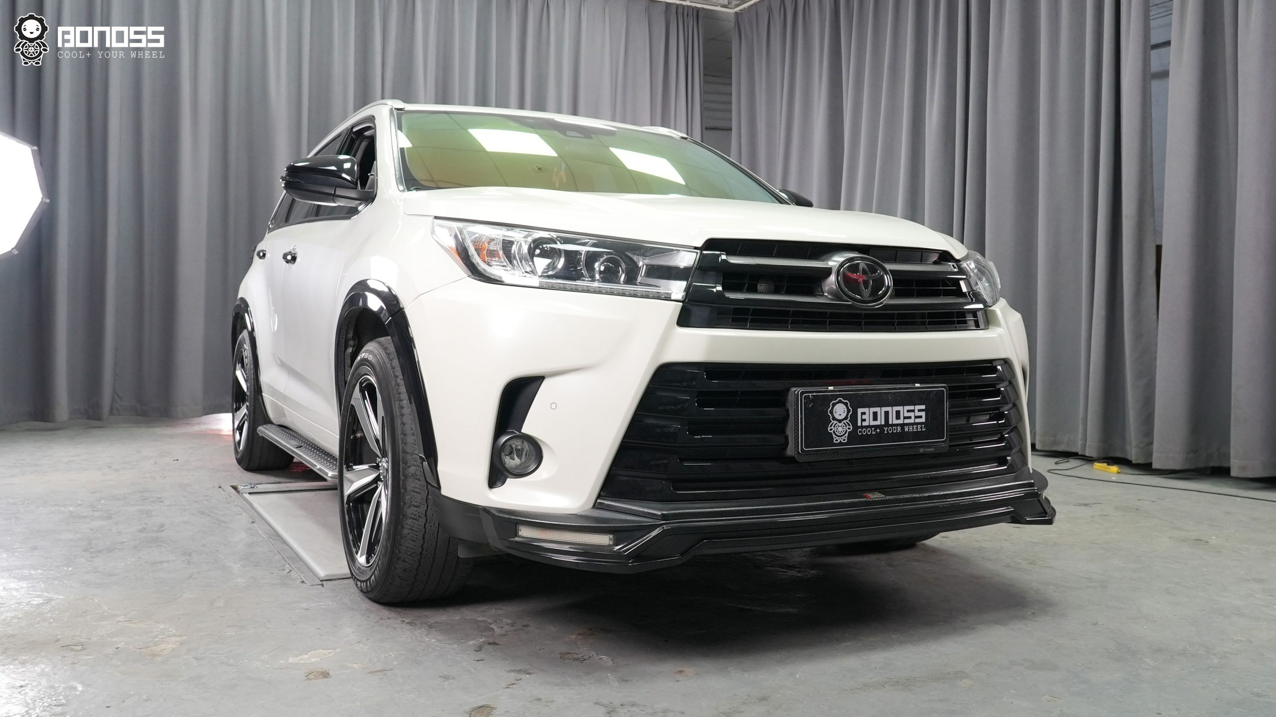 2018-toyota-highlander-wheel-spacers-after-full-car 2018 Toyota Highlander with 35mm BONOSS wheel spacers installed showing flush wide stance after body kit