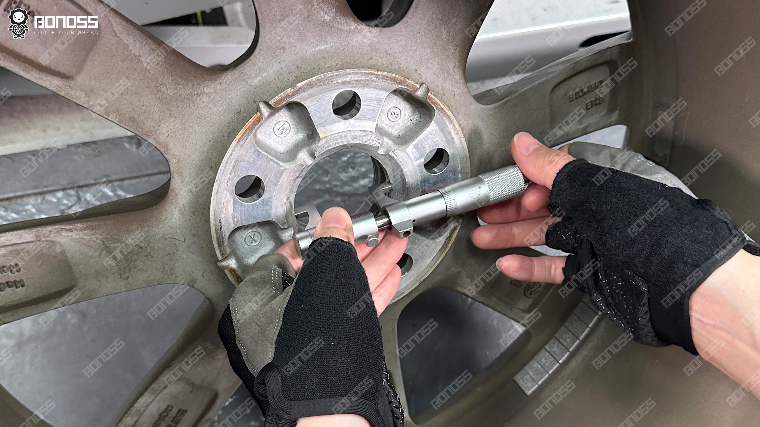beetle-wheel-center-bore-measurement Measuring 18x8J wheel center bore diameter on stock Beetle rims