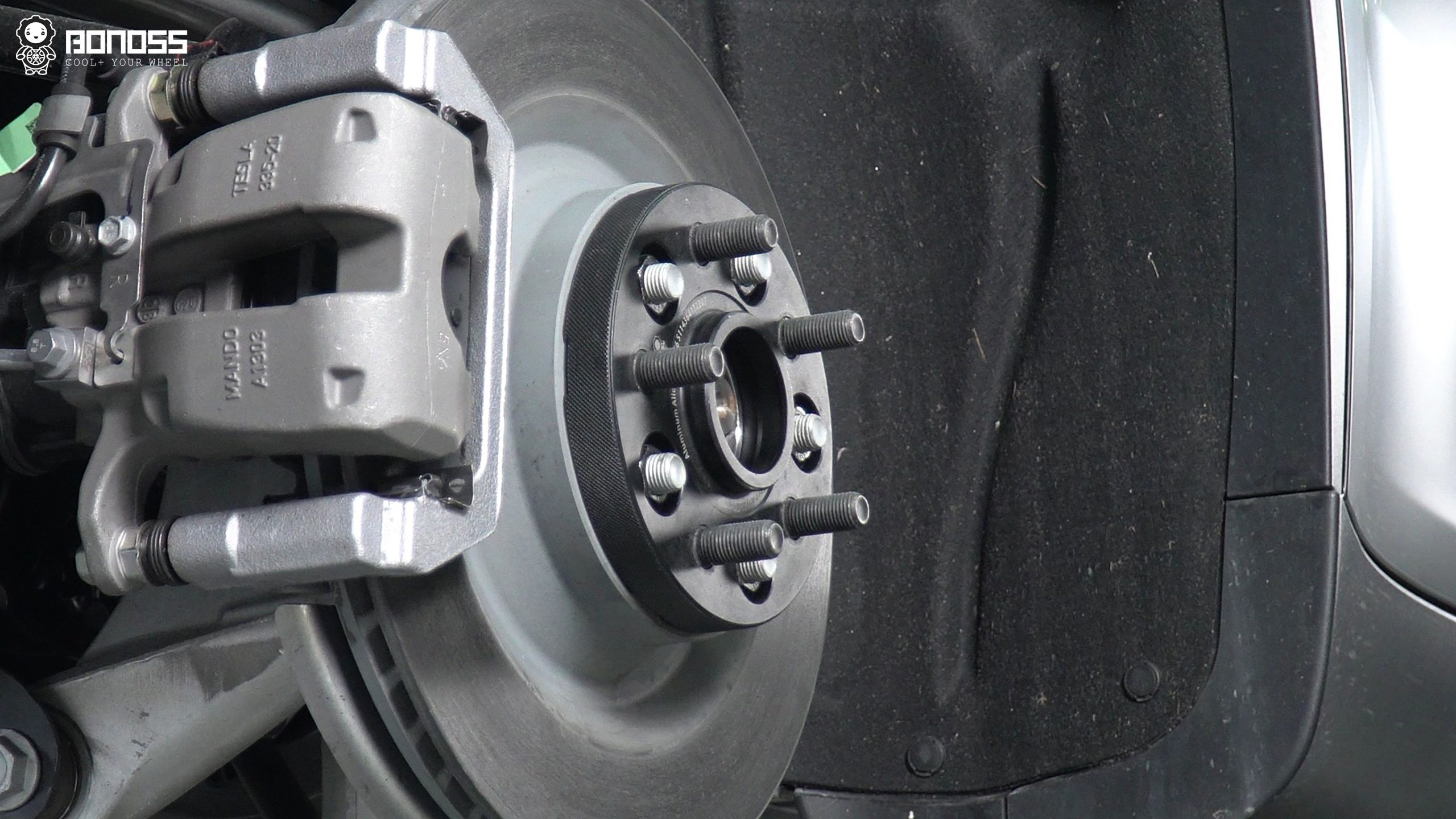 bonoss-20mm-spacer-installed-on-tesla-hub BONOSS 20mm wheel spacer installed on 2026 Tesla Model Y hub