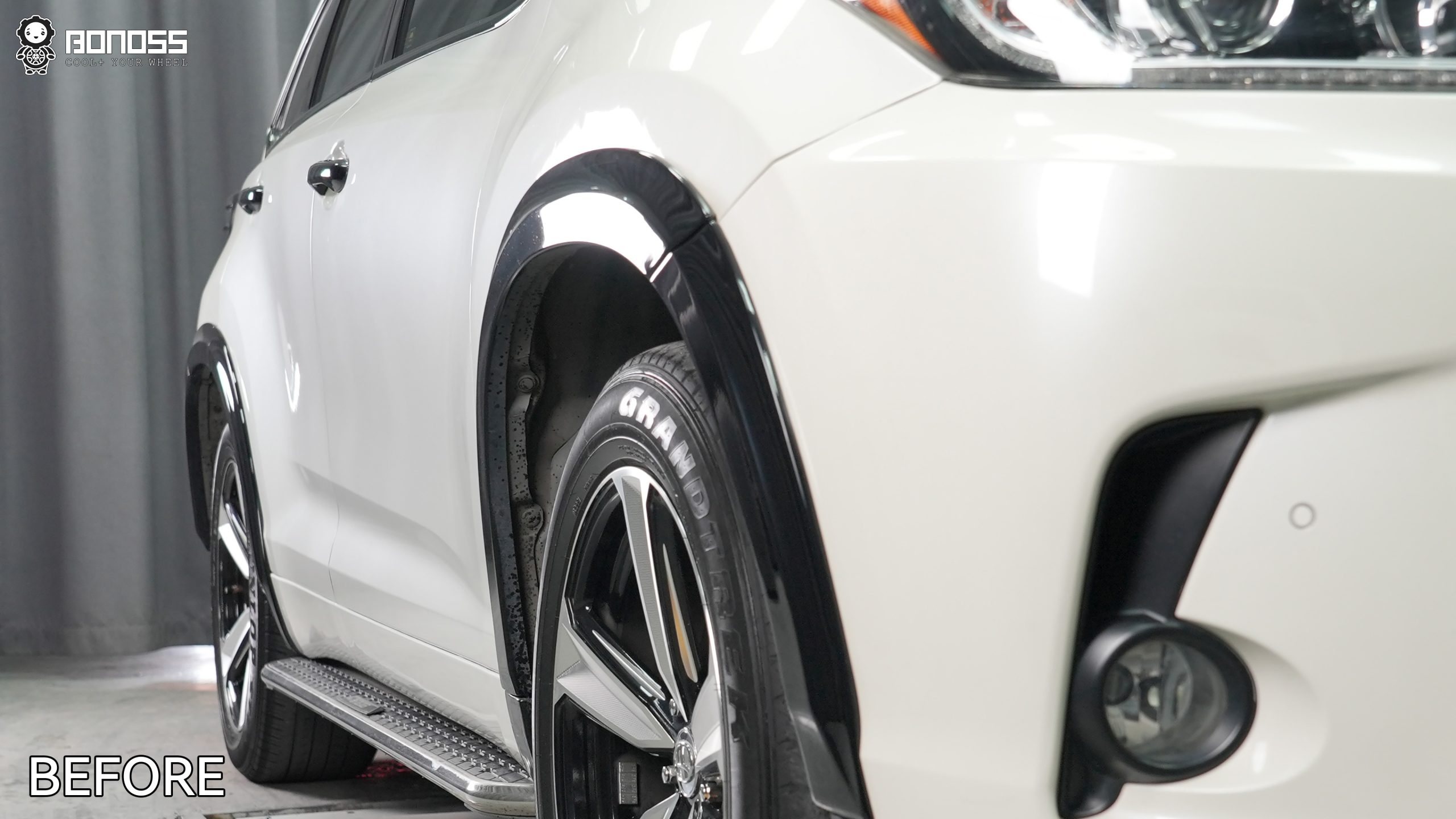 highlander-left-front-wheel-before-spacers Left front wheel of 2018 Toyota Highlander before 35mm wheel spacers showing sunken fitment
