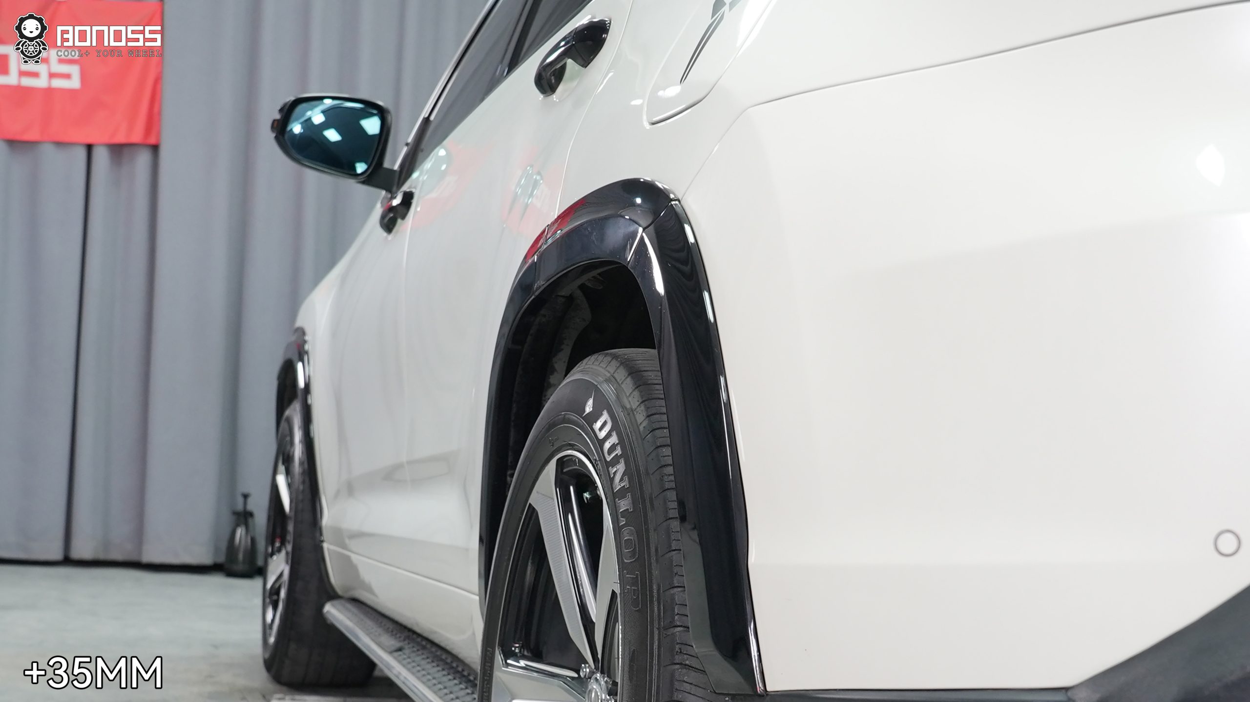 highlander-left-rear-wheel-after-spacers Left rear wheel of 2018 Toyota Highlander after 35mm wheel spacers showing flush alignment