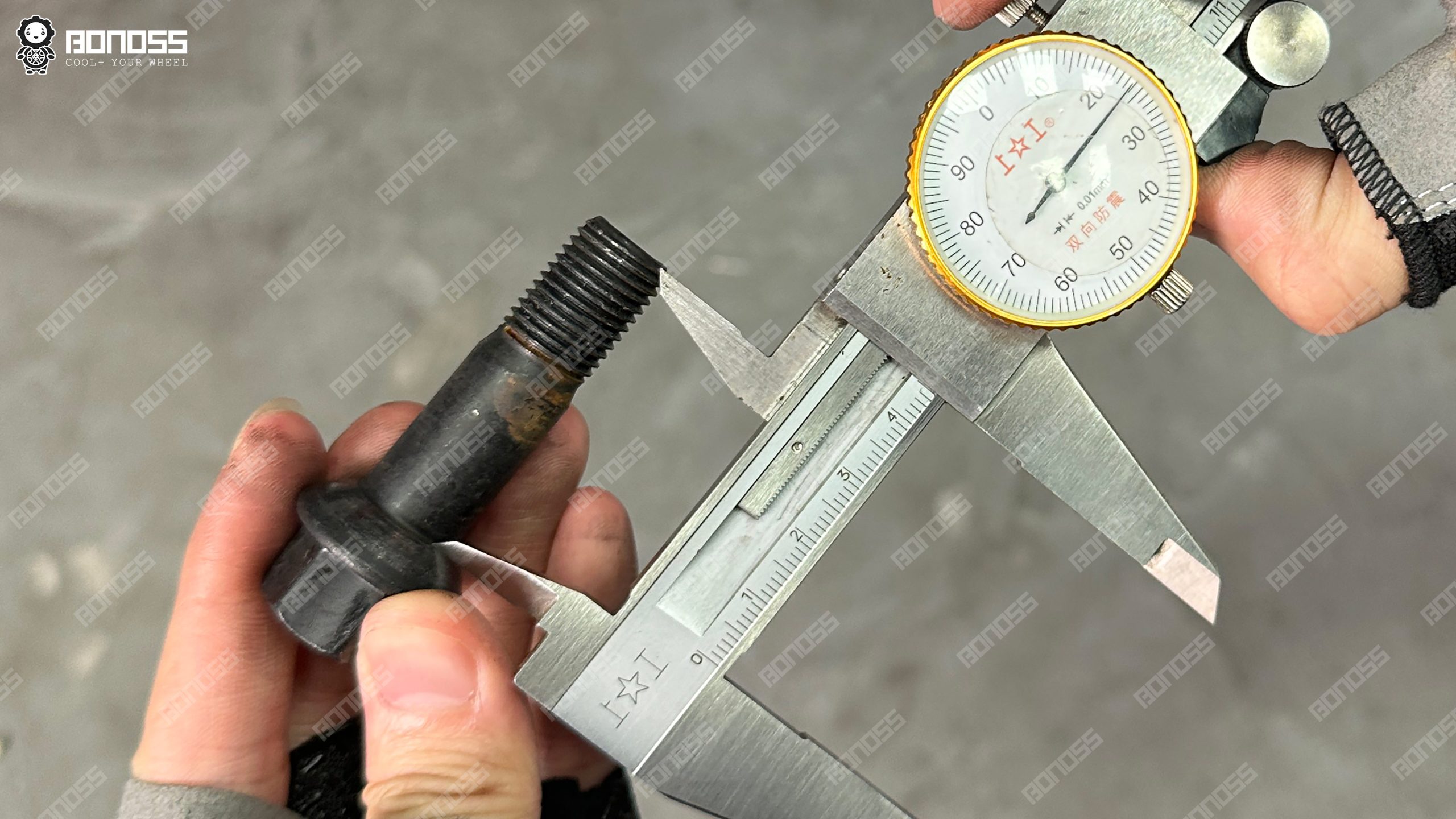 measuring-factory-bolt-thread-length-g63 Measuring factory M14x1.5 bolt 45mm thread length on 2026 G63 W465