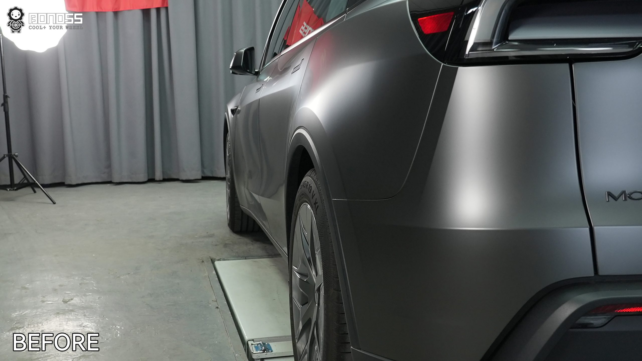 tesla-model-y-left-rear-wheel-before-spacer 2026 Tesla Model Y left rear wheel before 20mm spacer install