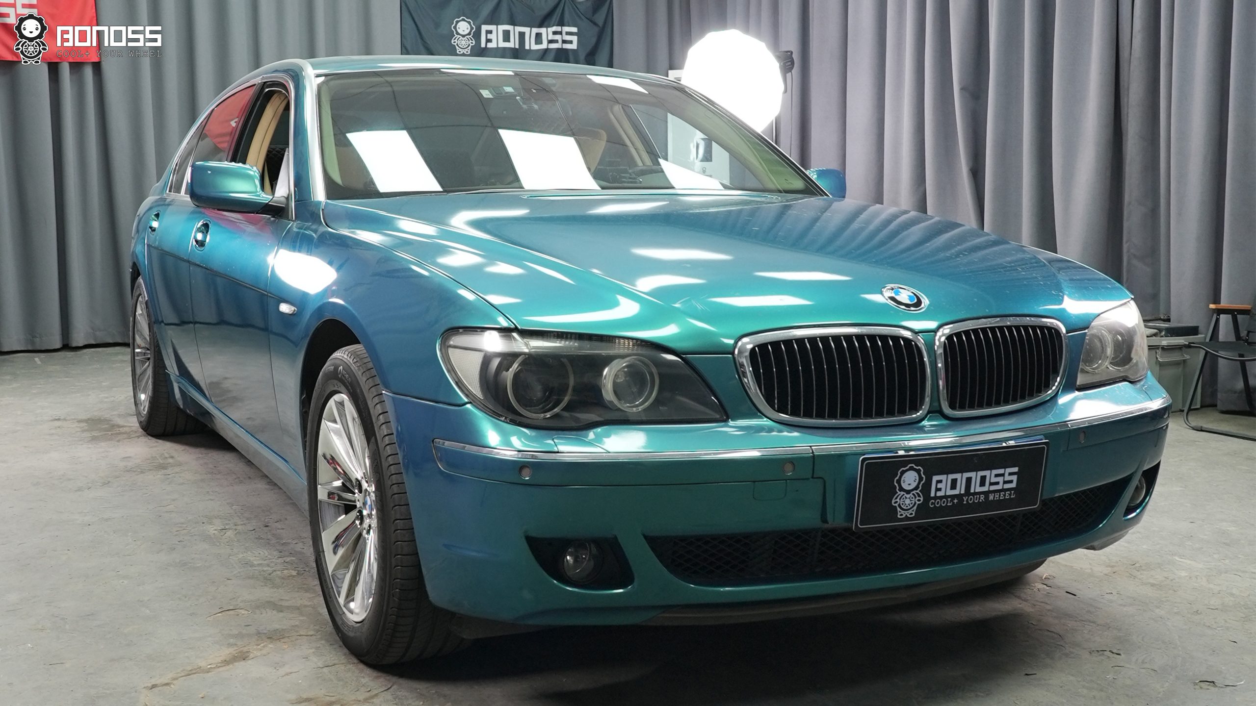 2005-bmw-e65-after-install-full-car-left-side 2005 BMW 7 Series E65 after BONOSS wheel spacers installation flush stance full car