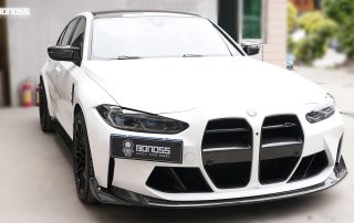 2021 BMW M3 G80 with body kit after wheel spacers install showing flush wheel stance