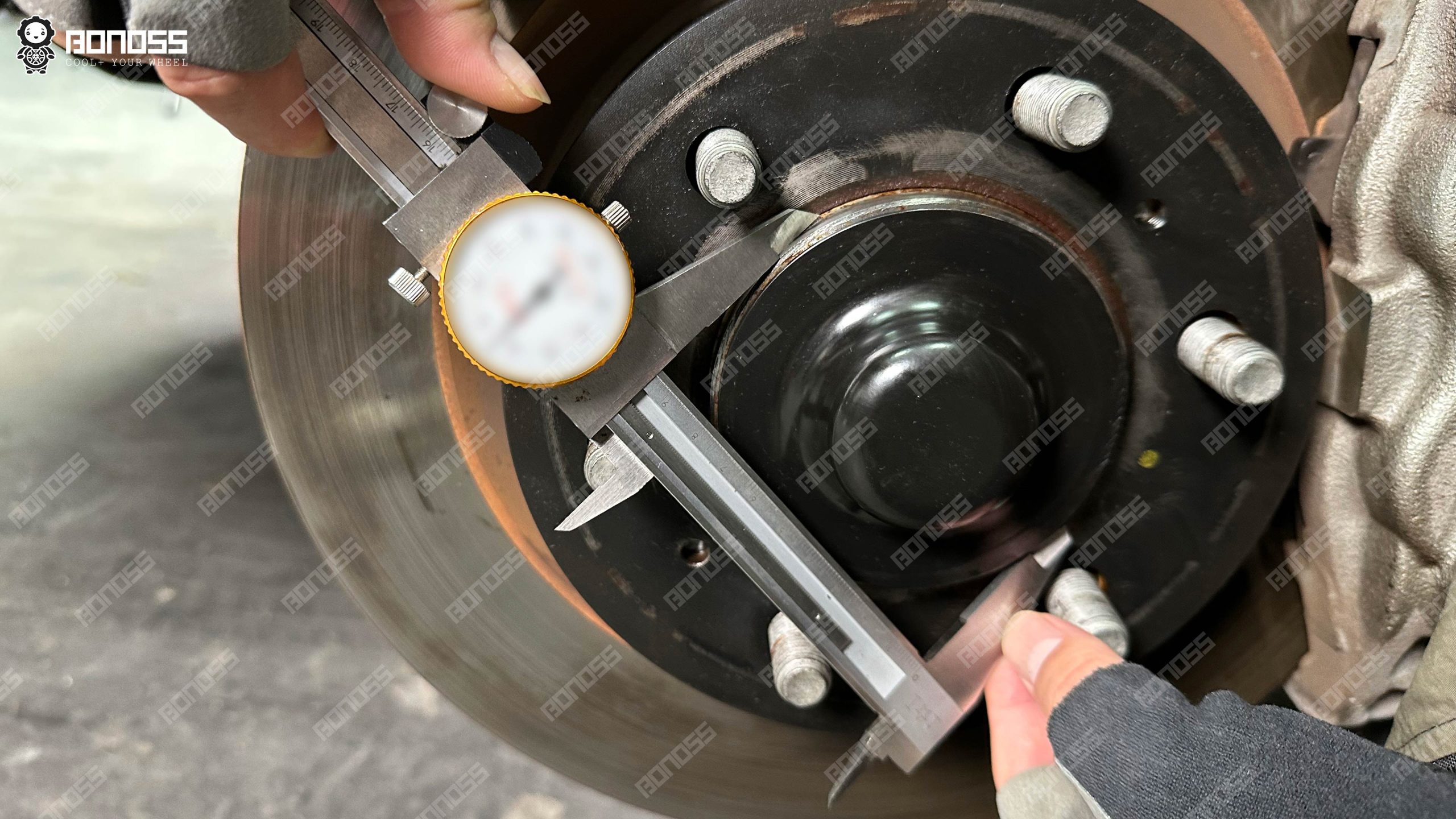 2022-toyota-lc300-hub-center-bore-94-92mm Measuring 94.92mm hub center bore on 2022 Toyota Land Cruiser 300 with vernier caliper