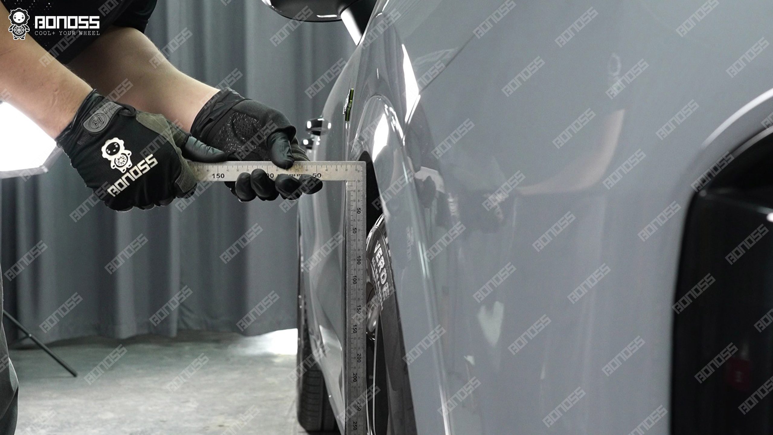 2023-porsche-cayenne-front-fender-gap-ruler High-accuracy ruler measuring the front left fender gap on a 2023 Porsche Cayenne before spacer install