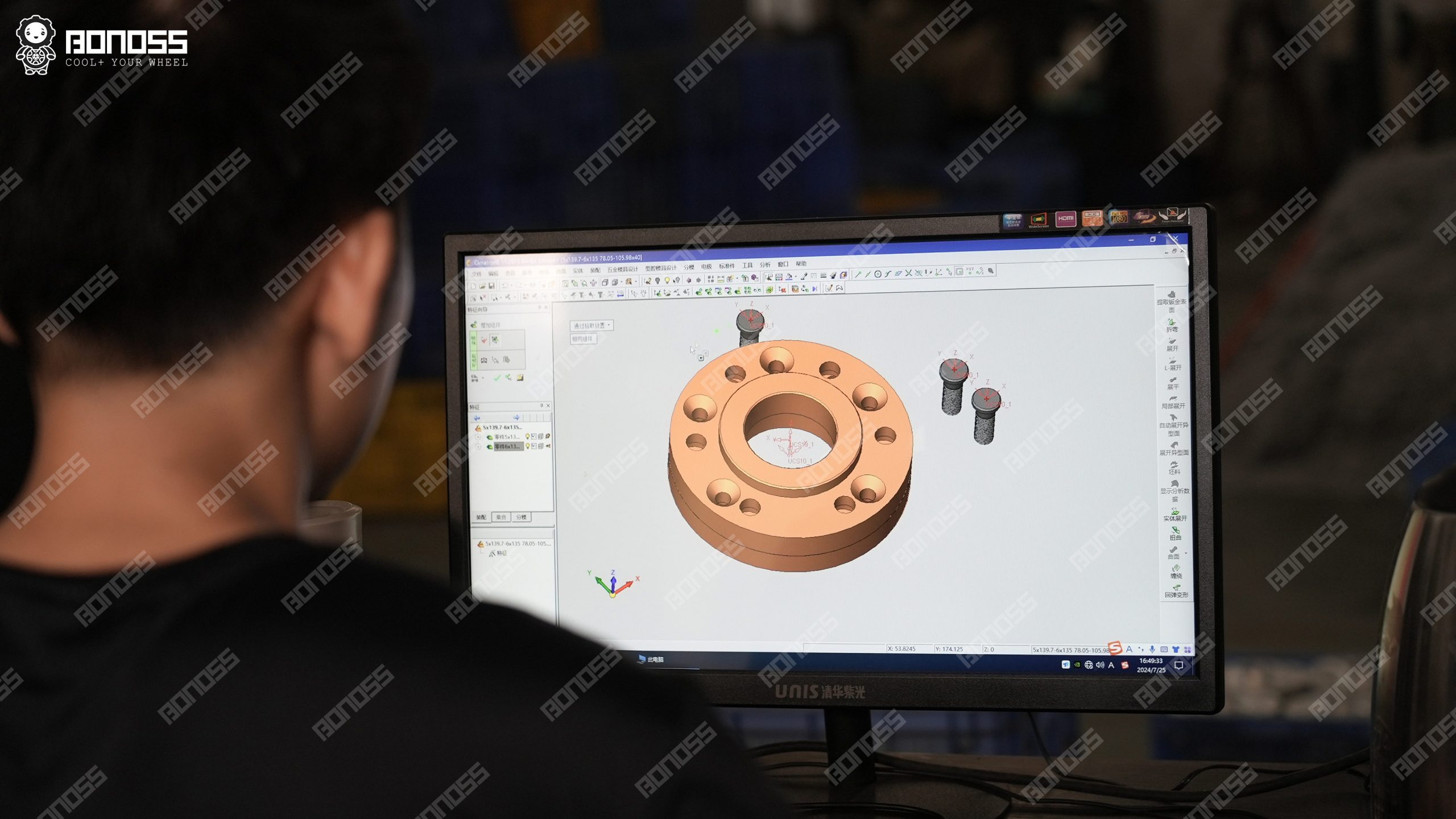 2026-range-rover-sport-spacer-design-cad BONOSS technician reviewing 2026 Range Rover Sport wheel spacer dimensions on CAD before machining