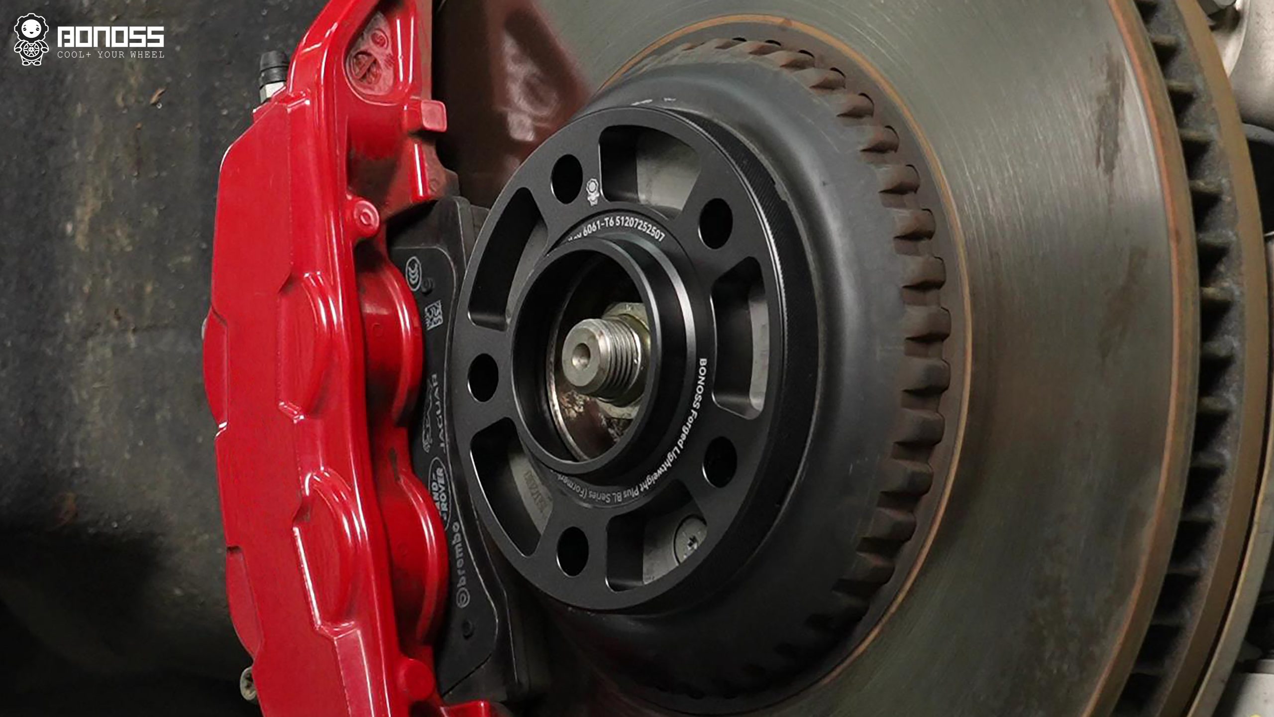 2026-range-rover-sport-spacer-installed-hub BONOSS hub-centric 2026 Range Rover Sport wheel spacer mounted on the hub