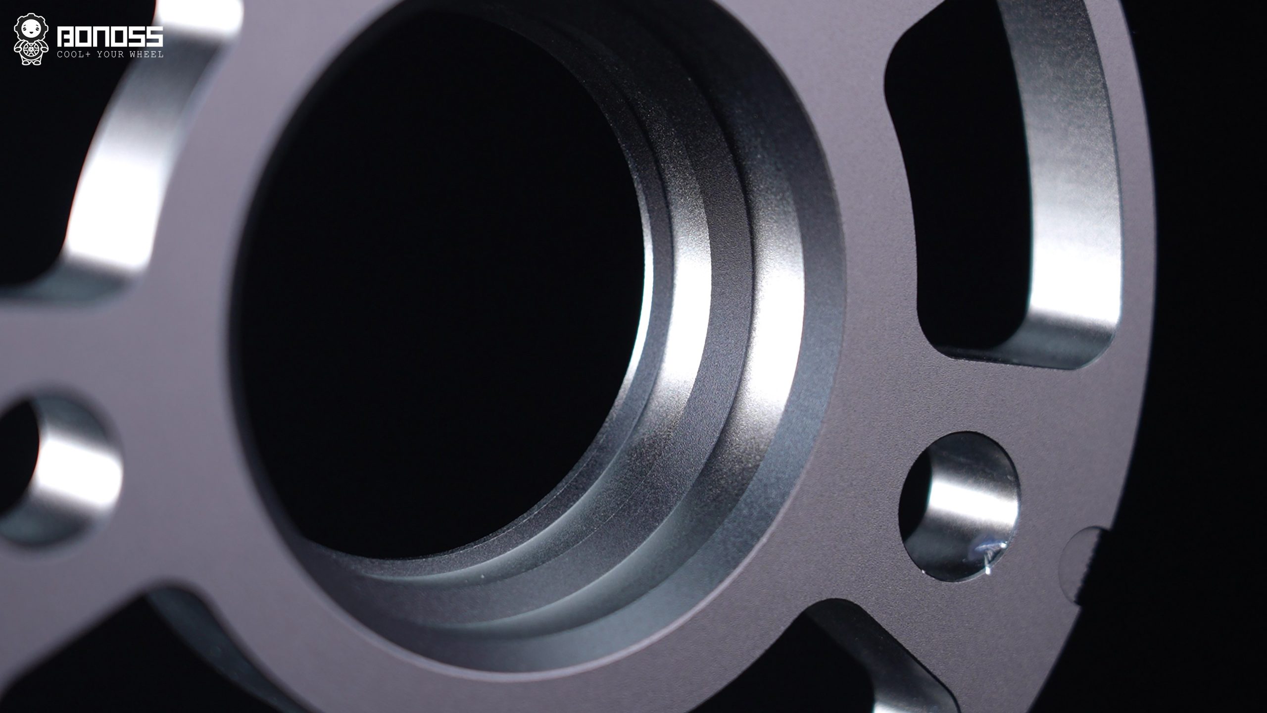 BONOSS multi-stage hub-centric wheel spacer showing chamfered center bore for G80 hub lip clearance BONOSS multi-stage hub-centric wheel spacer showing chamfered center bore for G80 hub lip clearance
