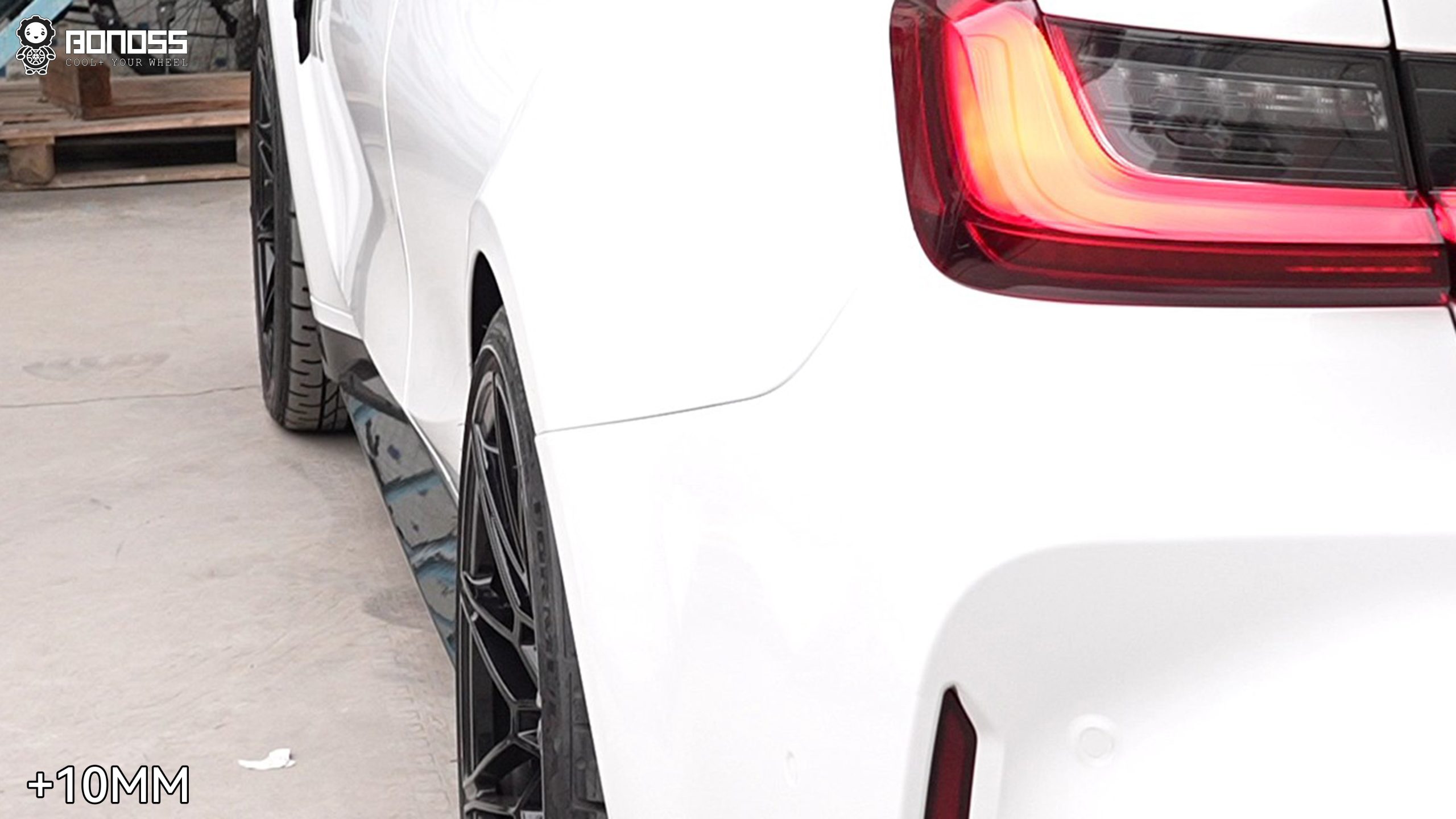 Rear-left wheel after 10mm spacer install showing flush fitment on BMW M3 G80 Rear-left wheel after 10mm spacer install showing flush fitment on BMW M3 G80