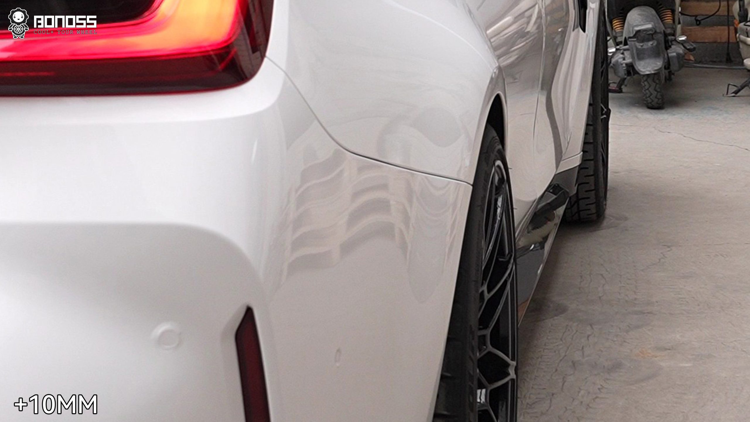Rear-right wheel after 10mm spacer install showing flush fitment on BMW M3 G80 Rear-right wheel after 10mm spacer install showing flush fitment on BMW M3 G80