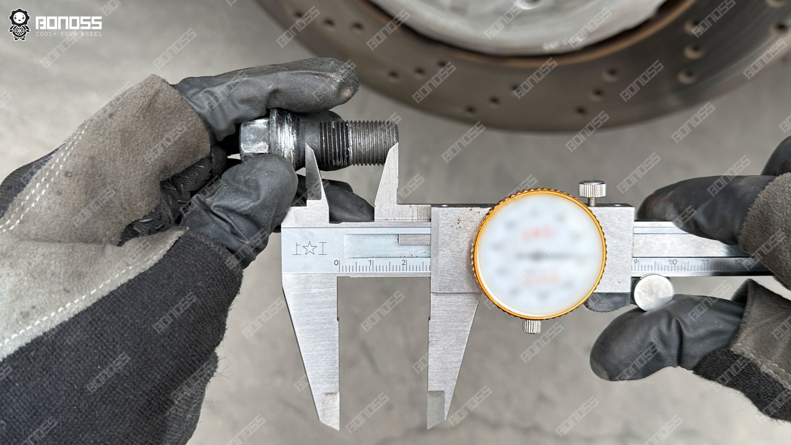 Vernier caliper measuring wheel bolt thread engagement length on a G80 M3 before choosing extended bolts Vernier caliper measuring wheel bolt thread engagement length on a G80 M3 before choosing extended bolts
