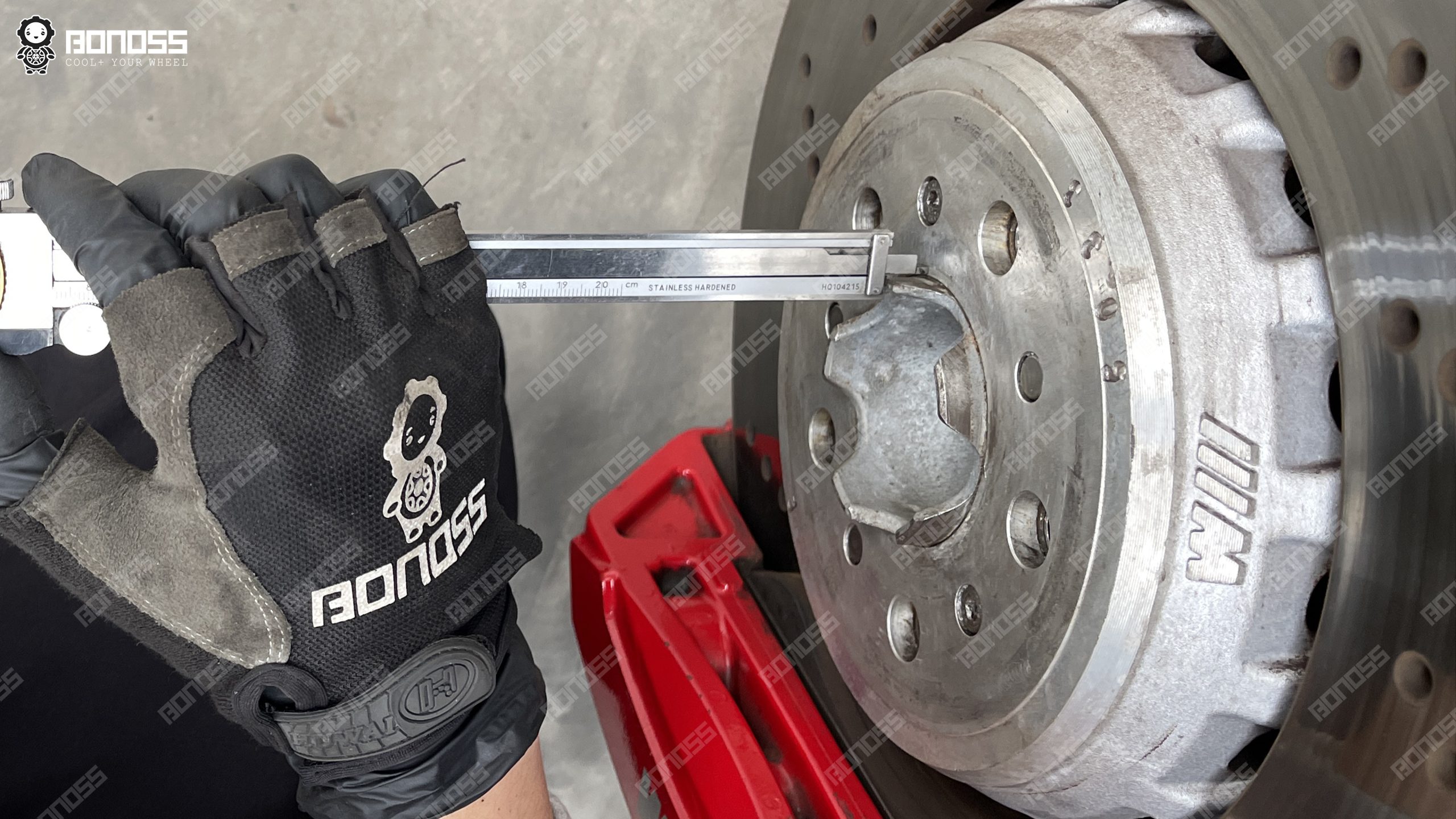 Vernier caliper measuring wheel hub lip height on a 2021 BMW M3 G80 for hub-centric spacer fit Vernier caliper measuring wheel hub lip height on a 2021 BMW M3 G80 for hub-centric spacer fit