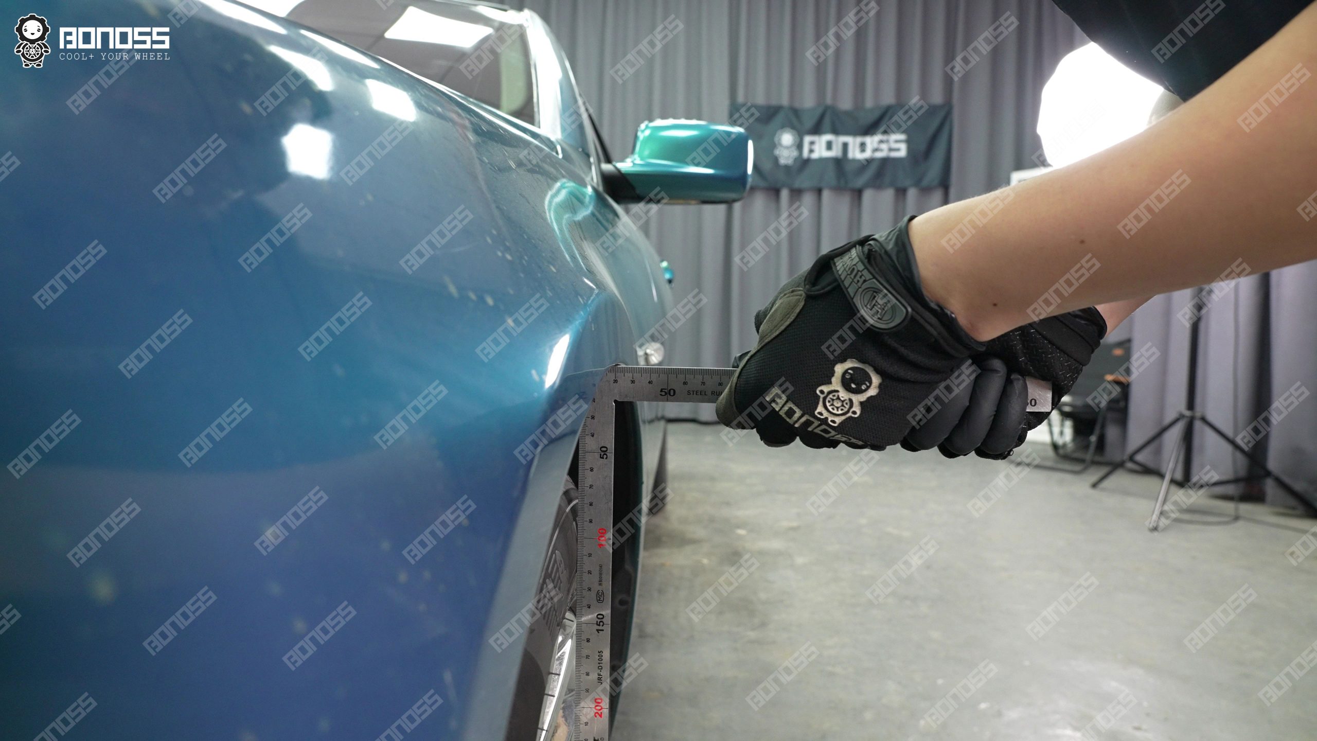 bmw-e65-front-right-flush-thickness-ruler Measuring BMW E65 right front wheel flush spacer thickness with high-accuracy ruler