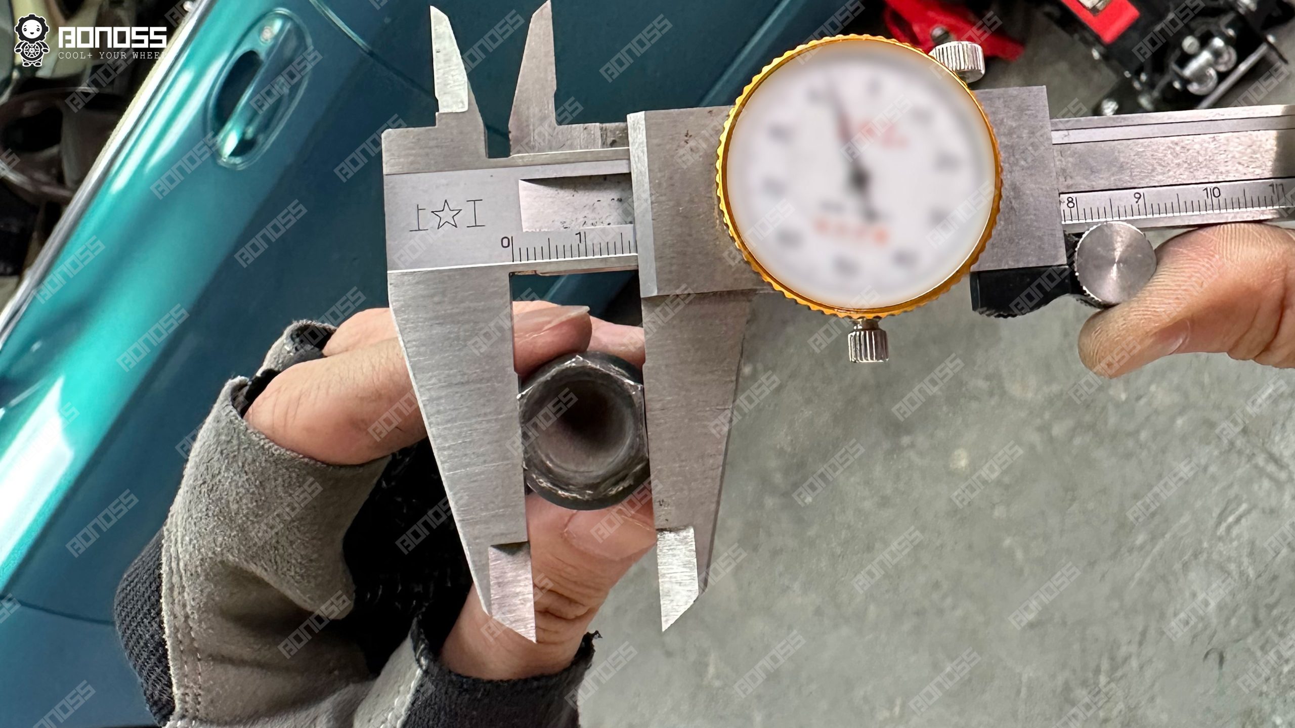 bmw-e65-wheel-bolt-hex-width-vernier-caliper Vernier caliper measuring BMW E65 wheel bolt 17mm hex socket size across flats