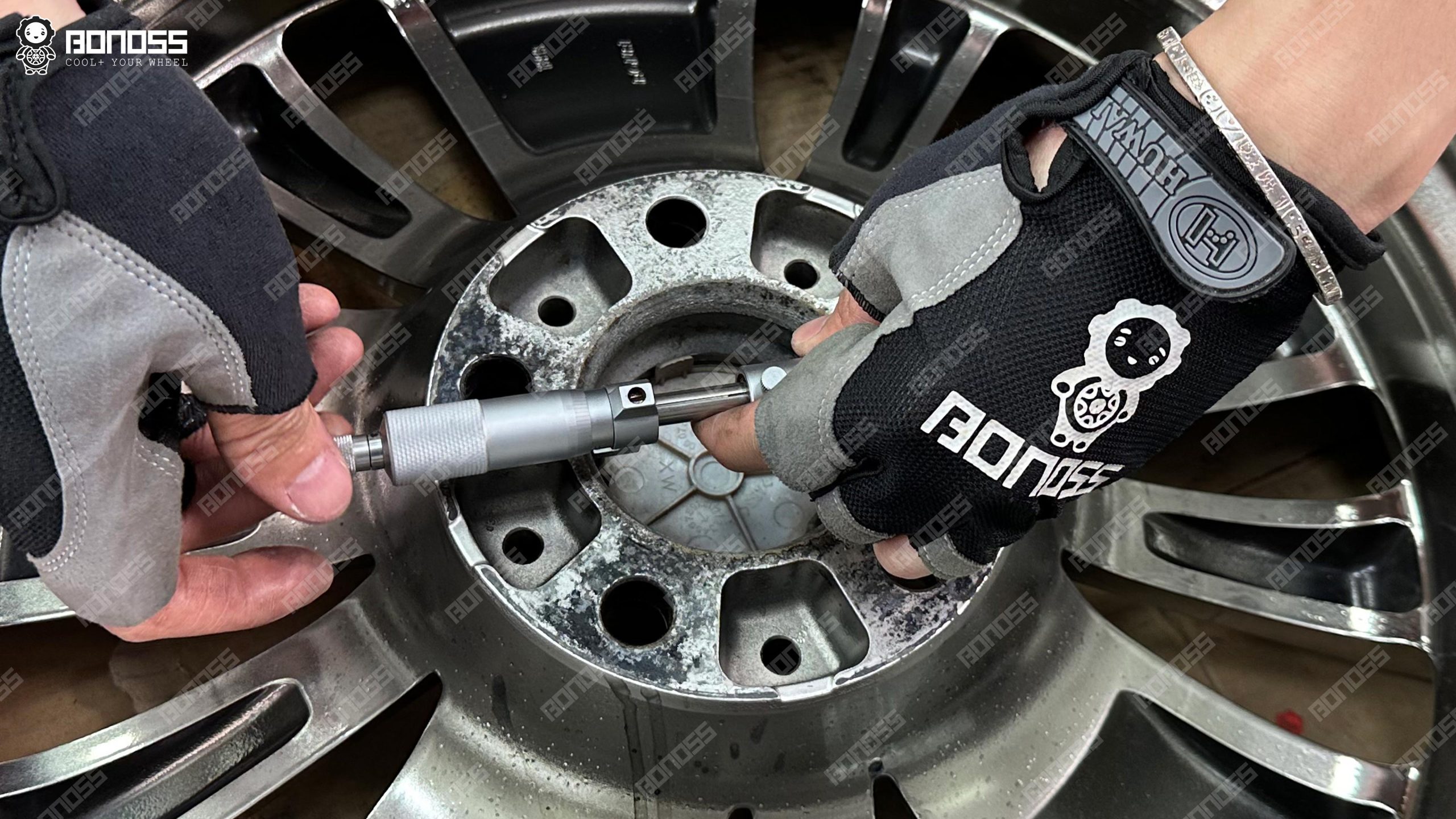 bmw-e65-wheel-center-bore-micrometer Micrometer measuring BMW E65 wheel center bore diameter for hub-centric spacer fitment