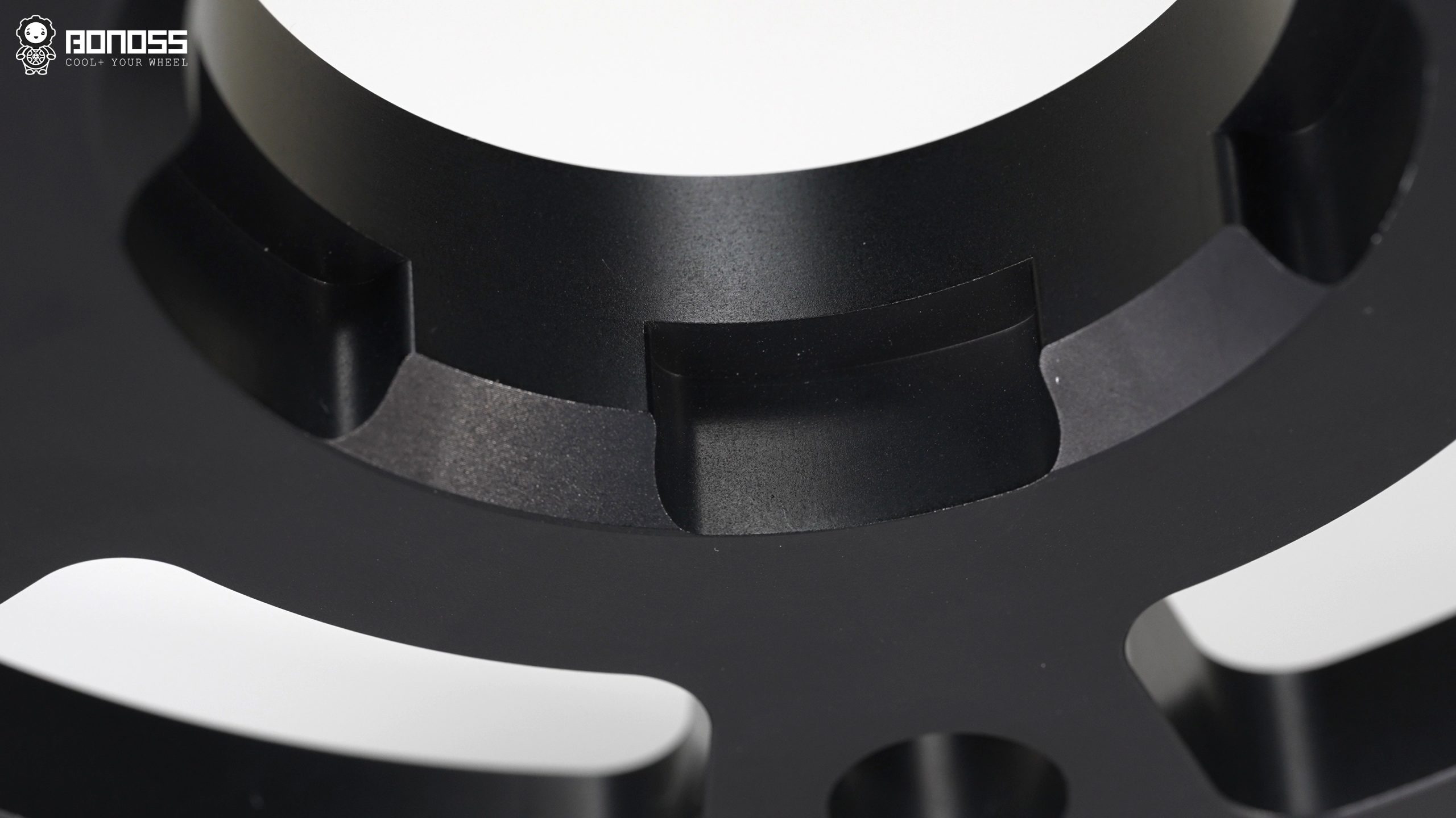 bonoss-lightweight-plus-porsche-cayenne-spacer-closeup BONOSS forged lightweight plus 10mm wheel spacer for Porsche Cayenne, close-up of the machined face and knurled edge