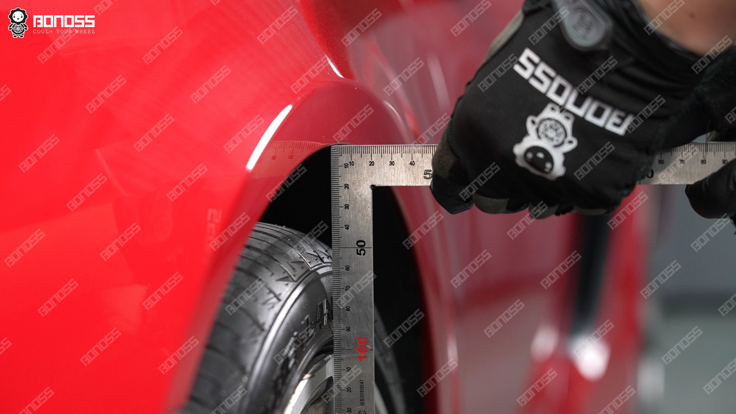 measuring-porsche-cayman-front-wheel-flush-ruler Measuring front wheel flush fitment with a high-accuracy ruler on a 2015 Porsche Cayman