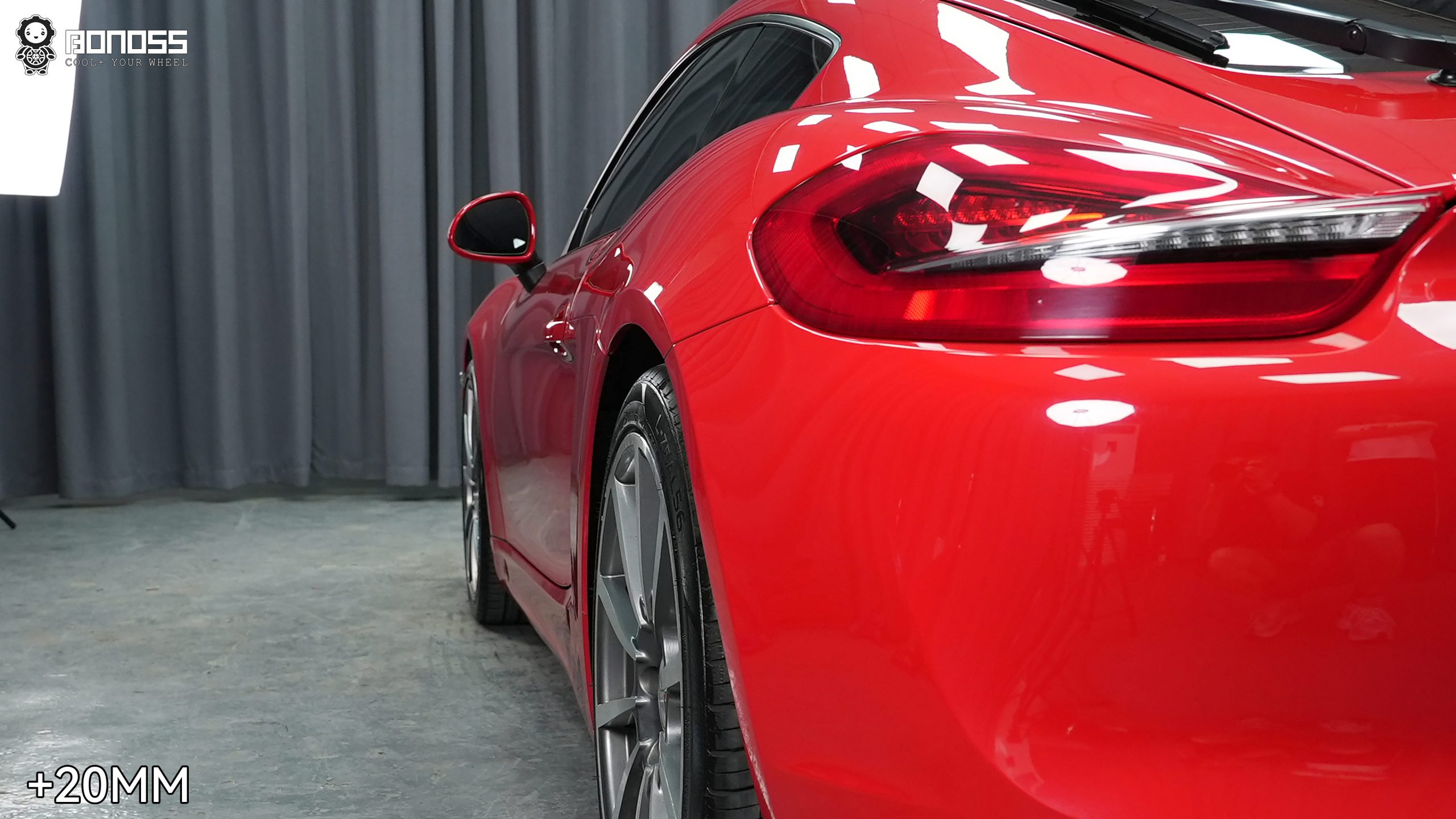porsche-cayman-left-rear-wheel-after-spacers Left rear wheel of a 2015 Porsche Cayman showing flush fitment after 20mm wheel spacers