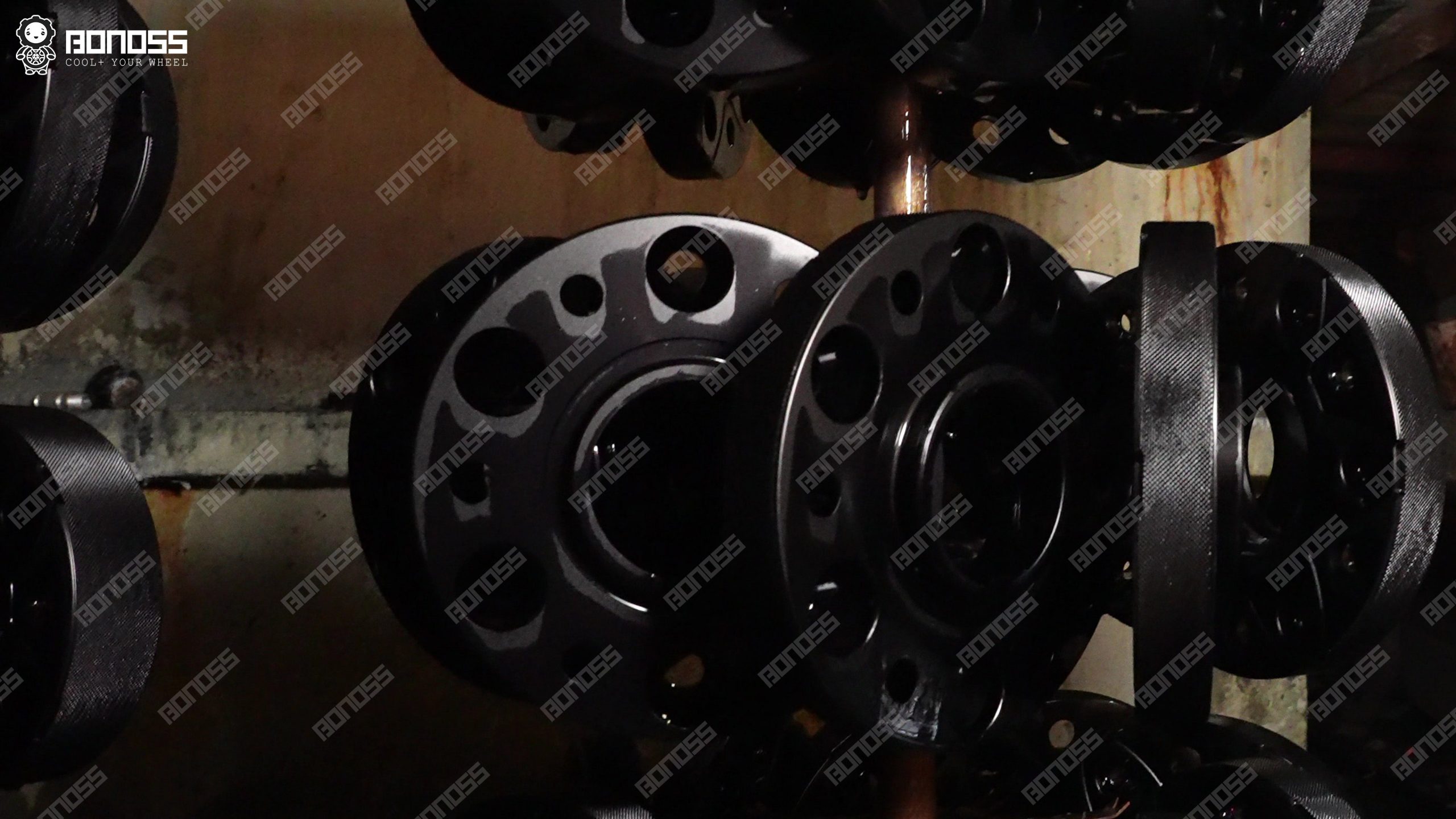 2023-porsche-taycan-bonoss-spacer-anodizing-factory Anodizing process on 2023 Porsche Taycan spacers at the BONOSS factory.