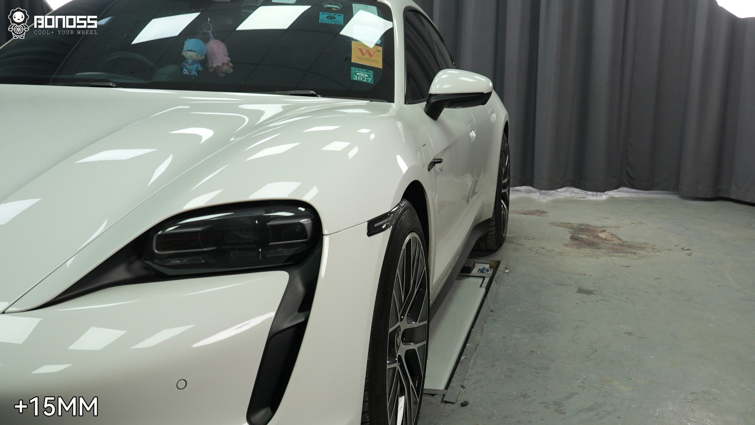 2023-porsche-taycan-front-right-wheel-after-spacer-install Front-right wheel flush after 15mm spacer on the 2023 Porsche Taycan.