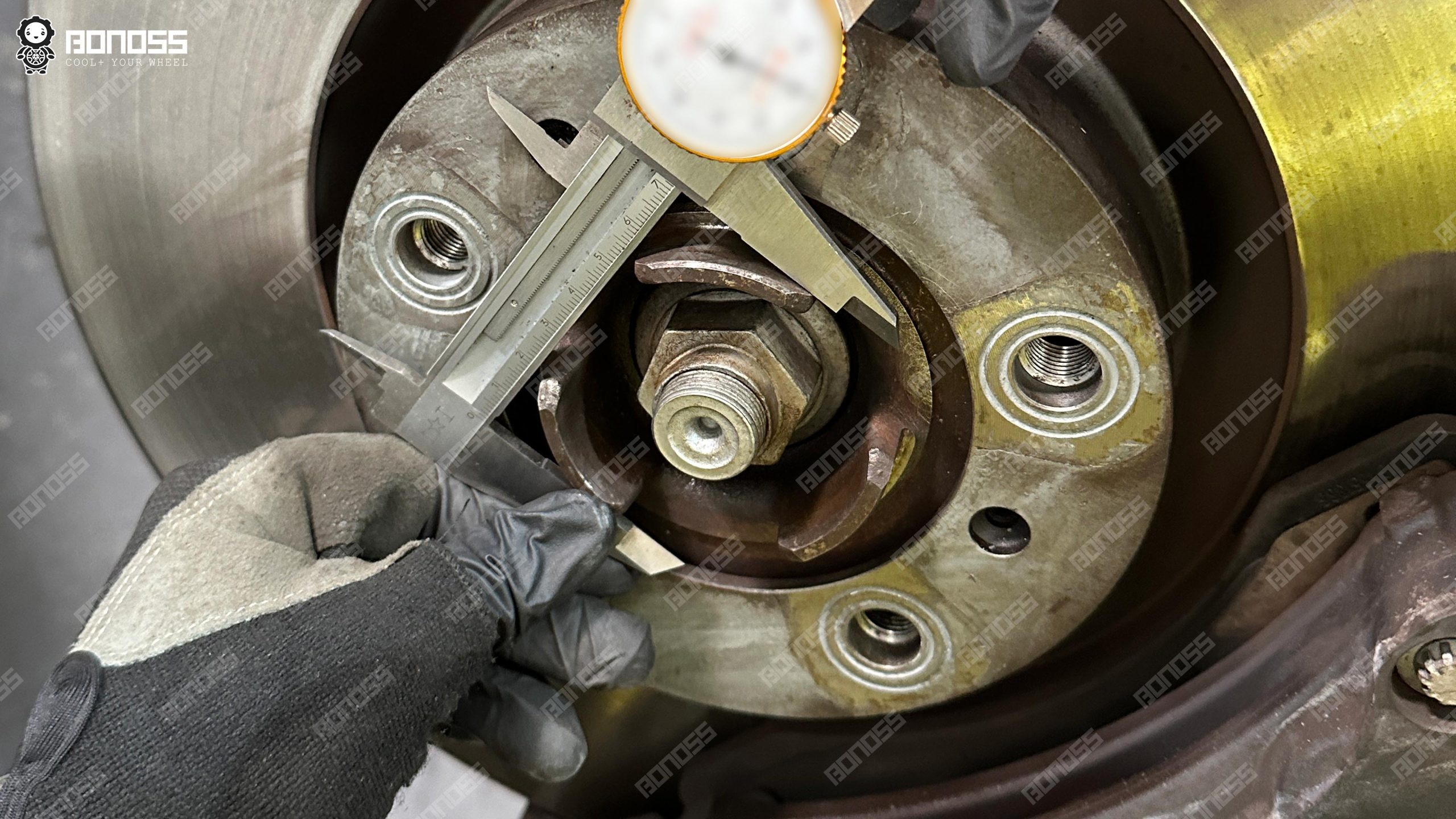 2023-porsche-taycan-hub-center-bore-caliper-measurement Caliper reading of the 71.47 mm hub bore on the 2023 Porsche Taycan.