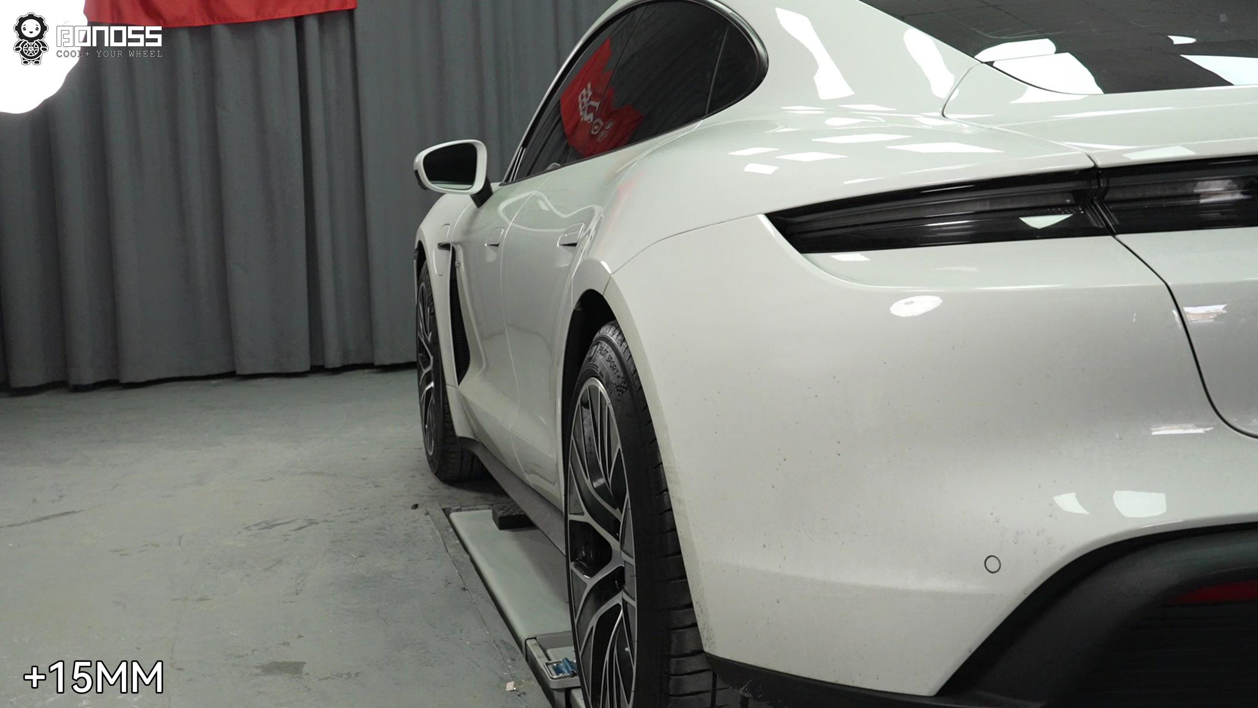 2023-porsche-taycan-rear-left-wheel-after-spacer-install Rear-left wheel flush after 15mm spacer on the 2023 Porsche Taycan.