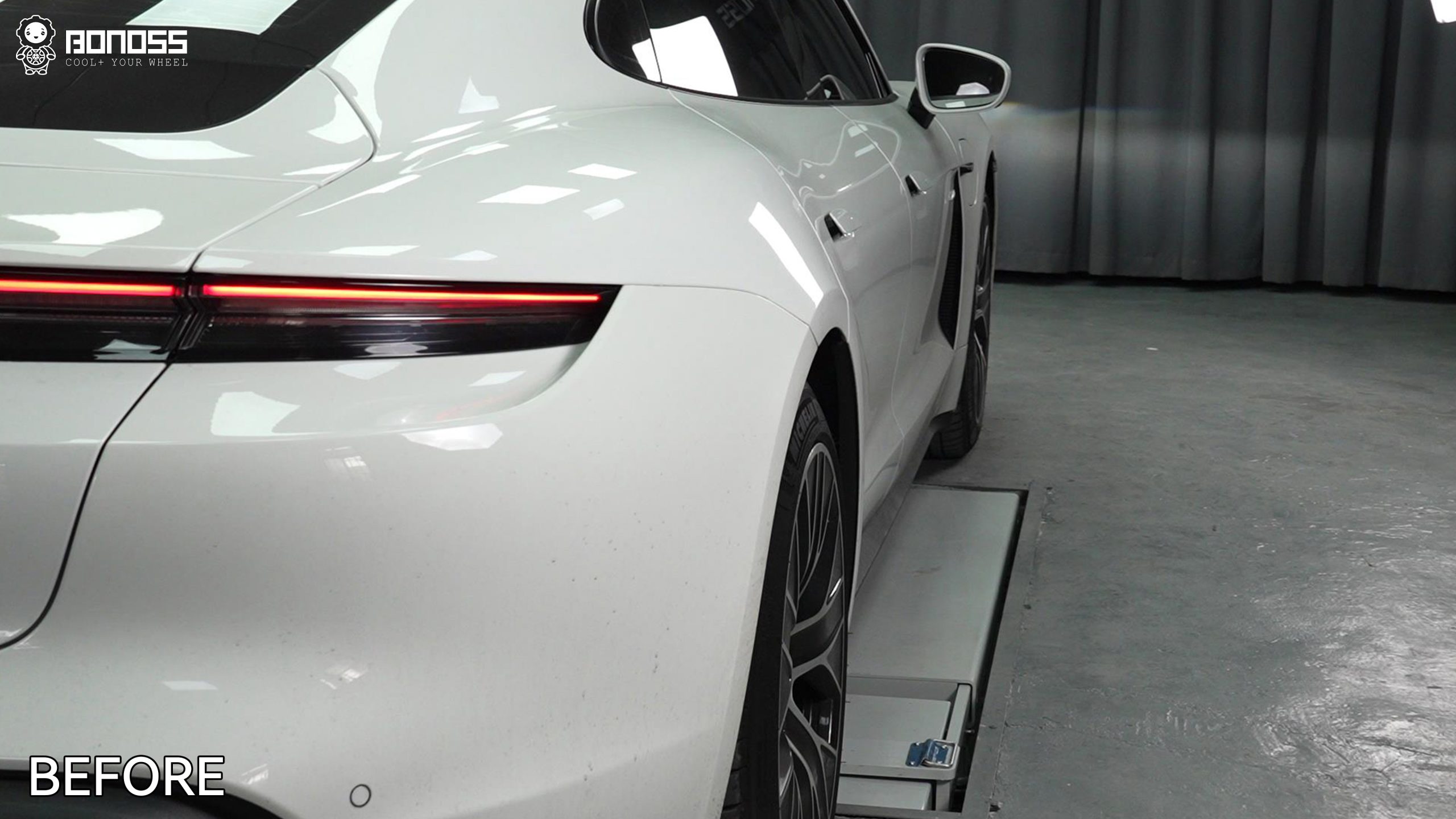 2023-porsche-taycan-rear-right-wheel-before-spacer-install Rear-right wheel before spacer install on the 2023 Porsche Taycan stock offset.