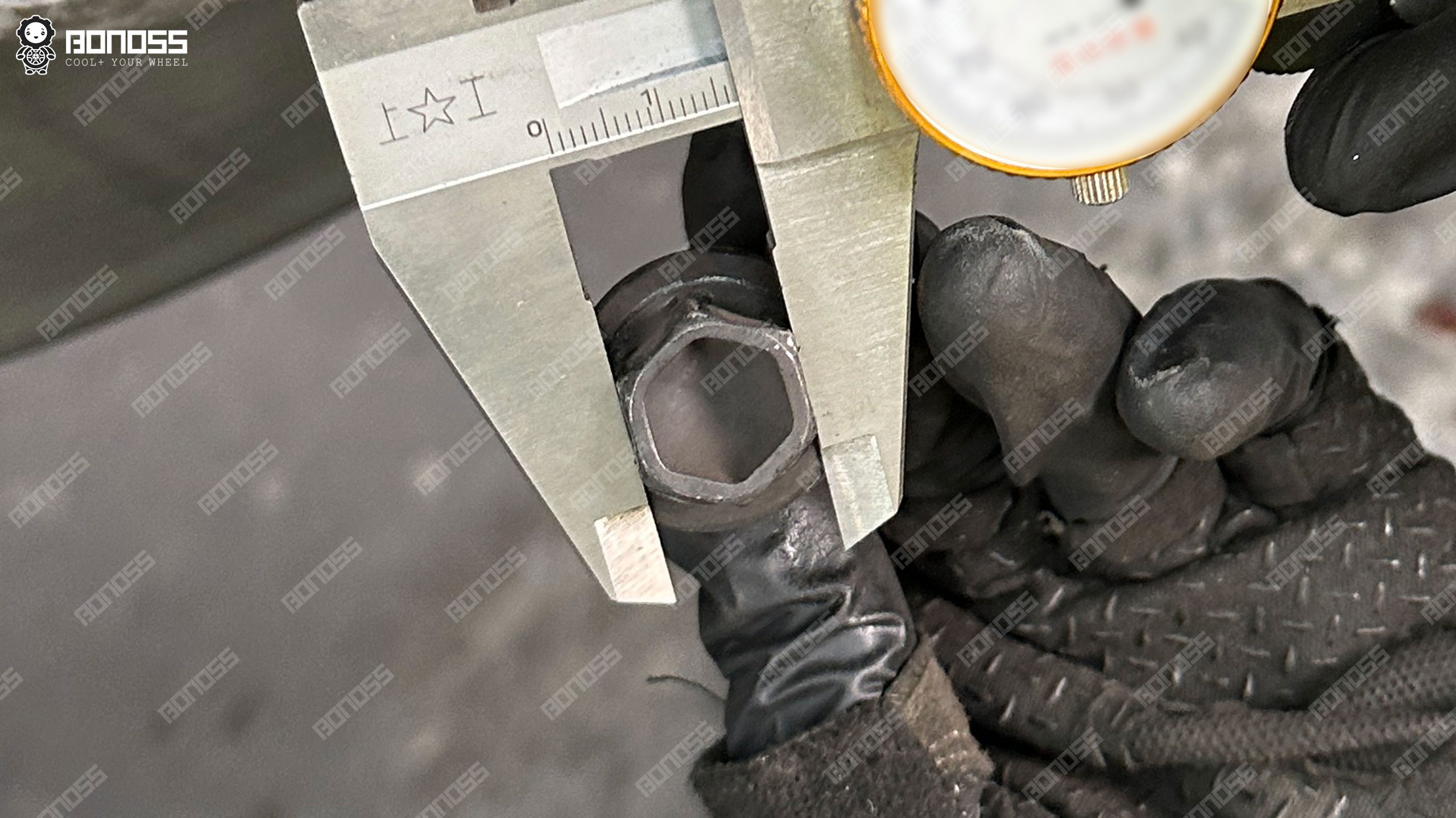 2023-porsche-taycan-wheel-bolt-hex-size-caliper-measurement Measuring the 17mm wheel bolt hex on the 2023 Porsche Taycan.