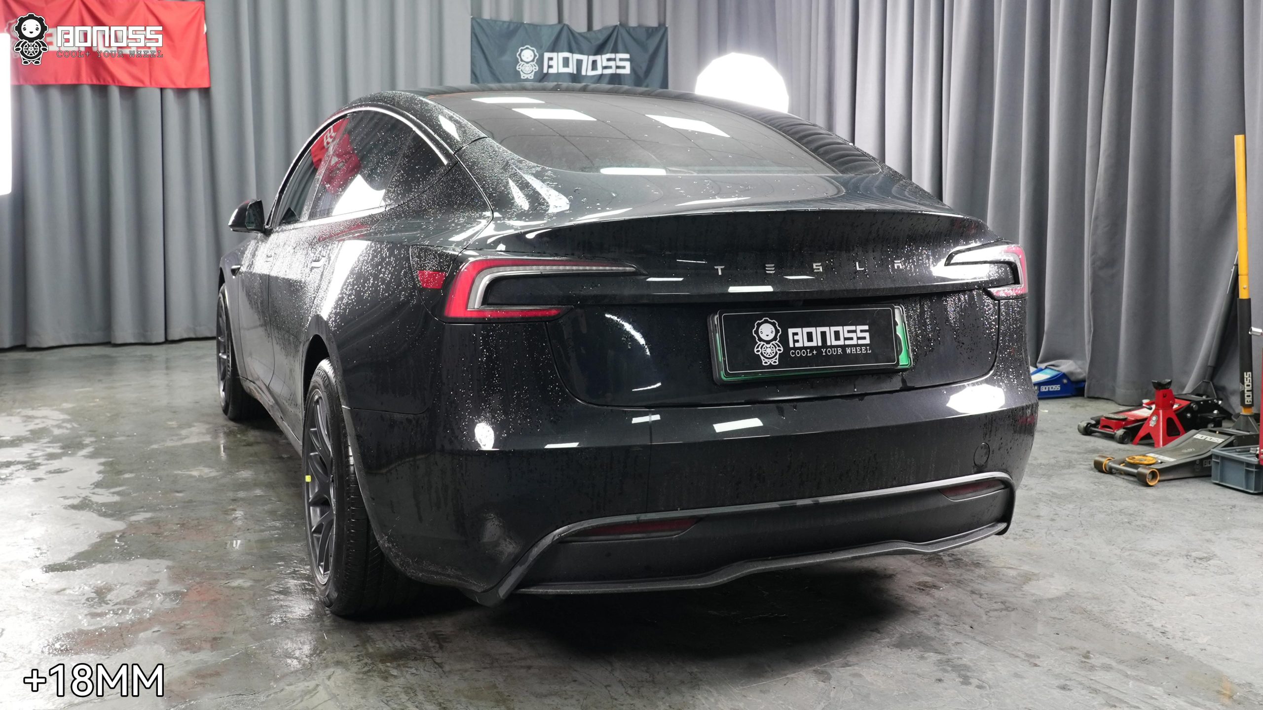 2023-tesla-model-3-18mm-wheel-spacers-final-flush-rear-view Full-car result displaying the flush rear stance from 2023 Tesla Model 3 18mm wheel spacers.