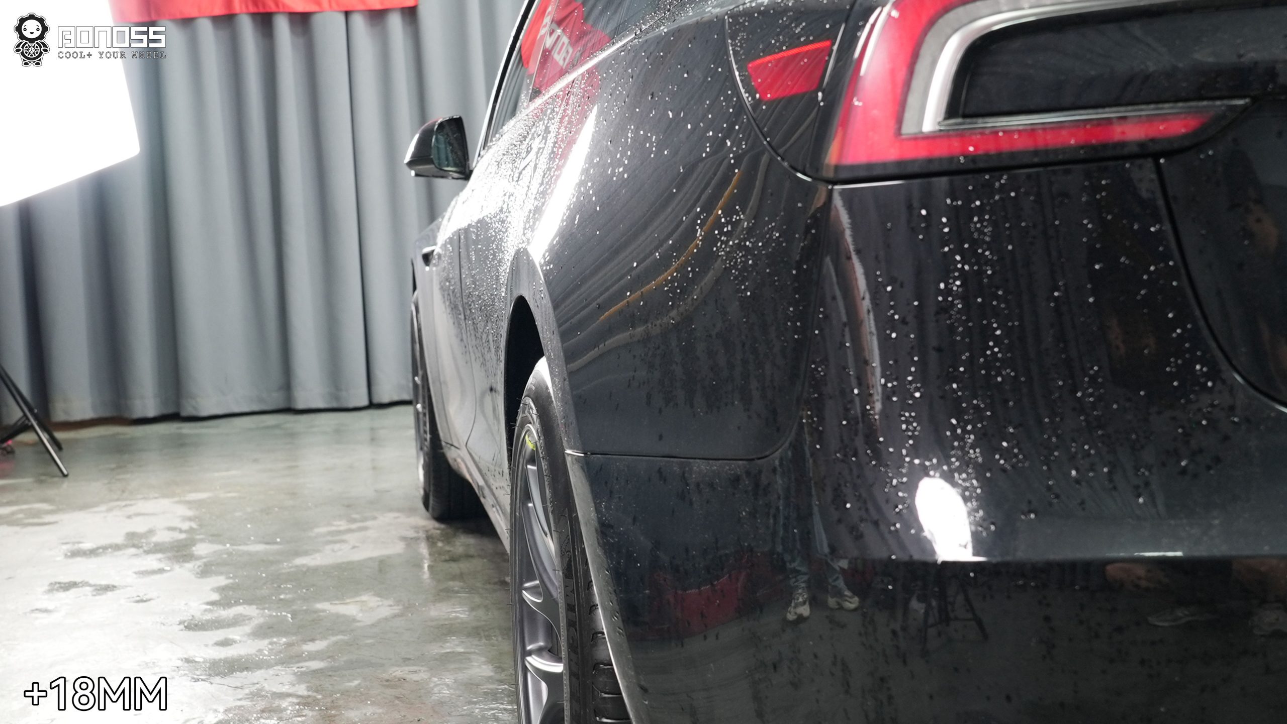 2023-tesla-model-3-18mm-wheel-spacers-left-rear-after Completed left-rear stance showing the result of 2023 Tesla Model 3 18mm wheel spacers.