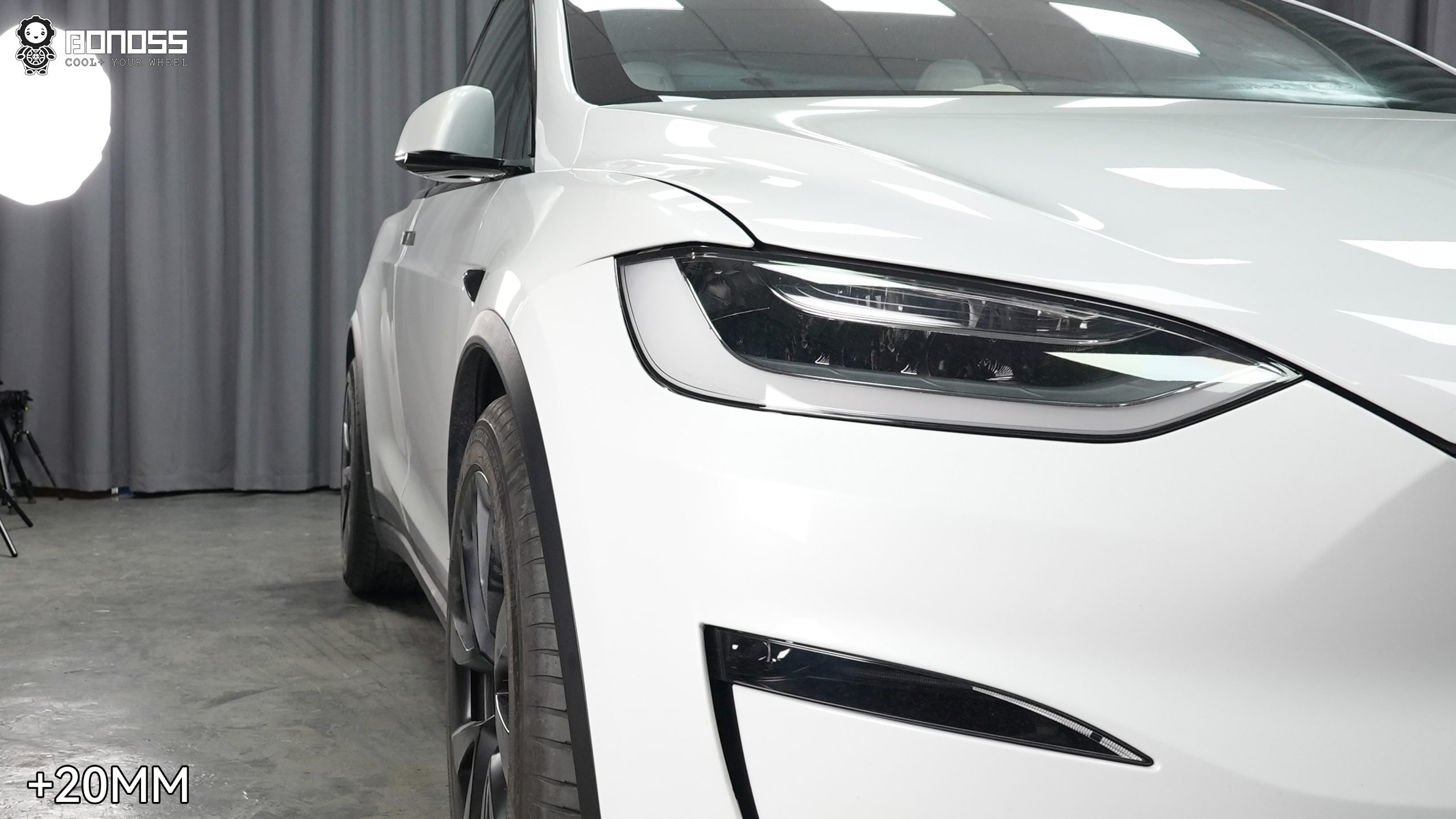 2023-tesla-model-x-left-front-wheel-after-20mm-spacer-flush Flush left front stance on a 2023 Tesla Model X with a 20mm hub-centric spacer installed.