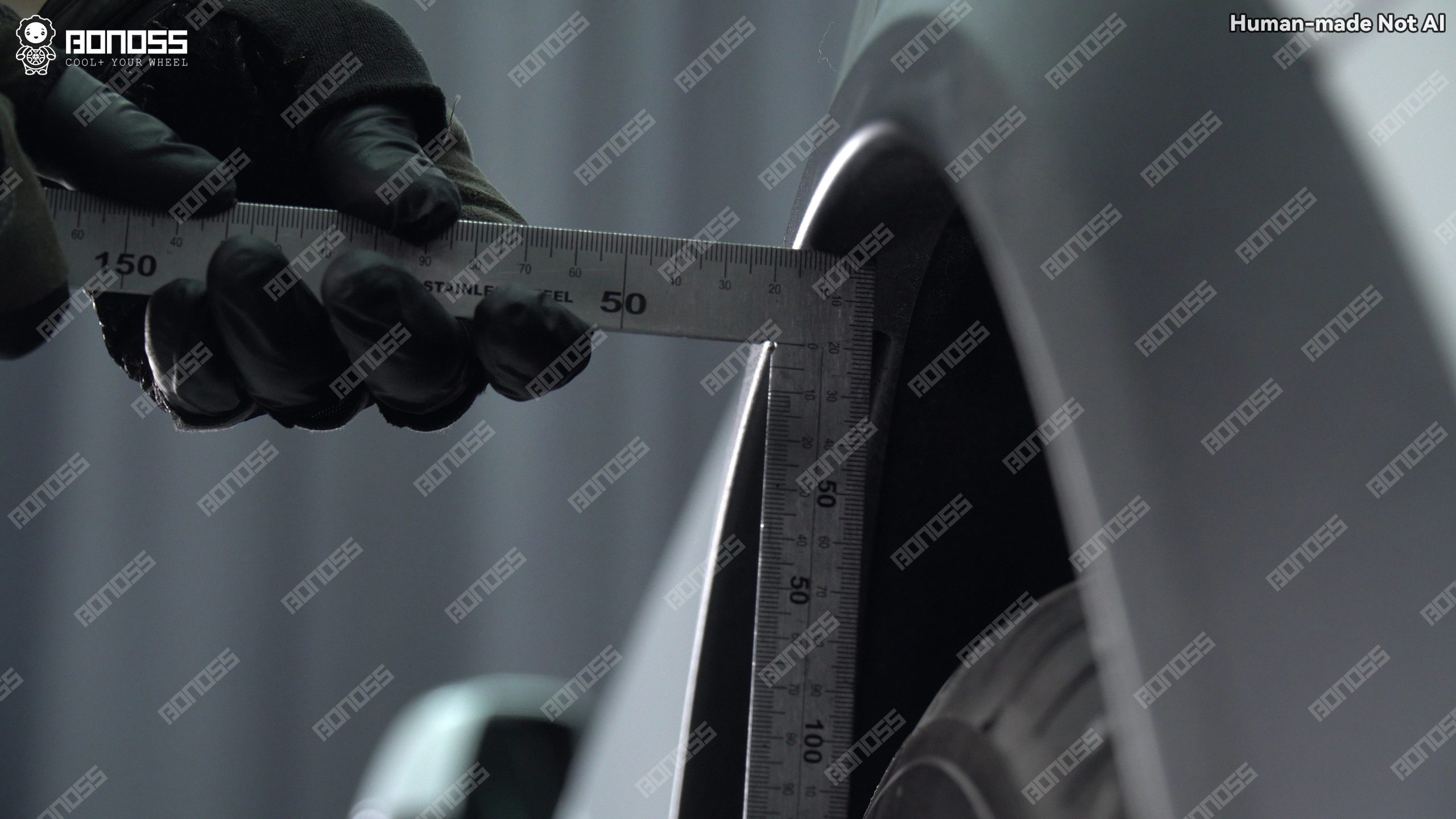 2023-tesla-model-x-left-rear-fender-gap-measurement-for-spacer-sizing Rear fender-to-tire gap being measured on a 2023 Tesla Model X for 20mm spacer planning.