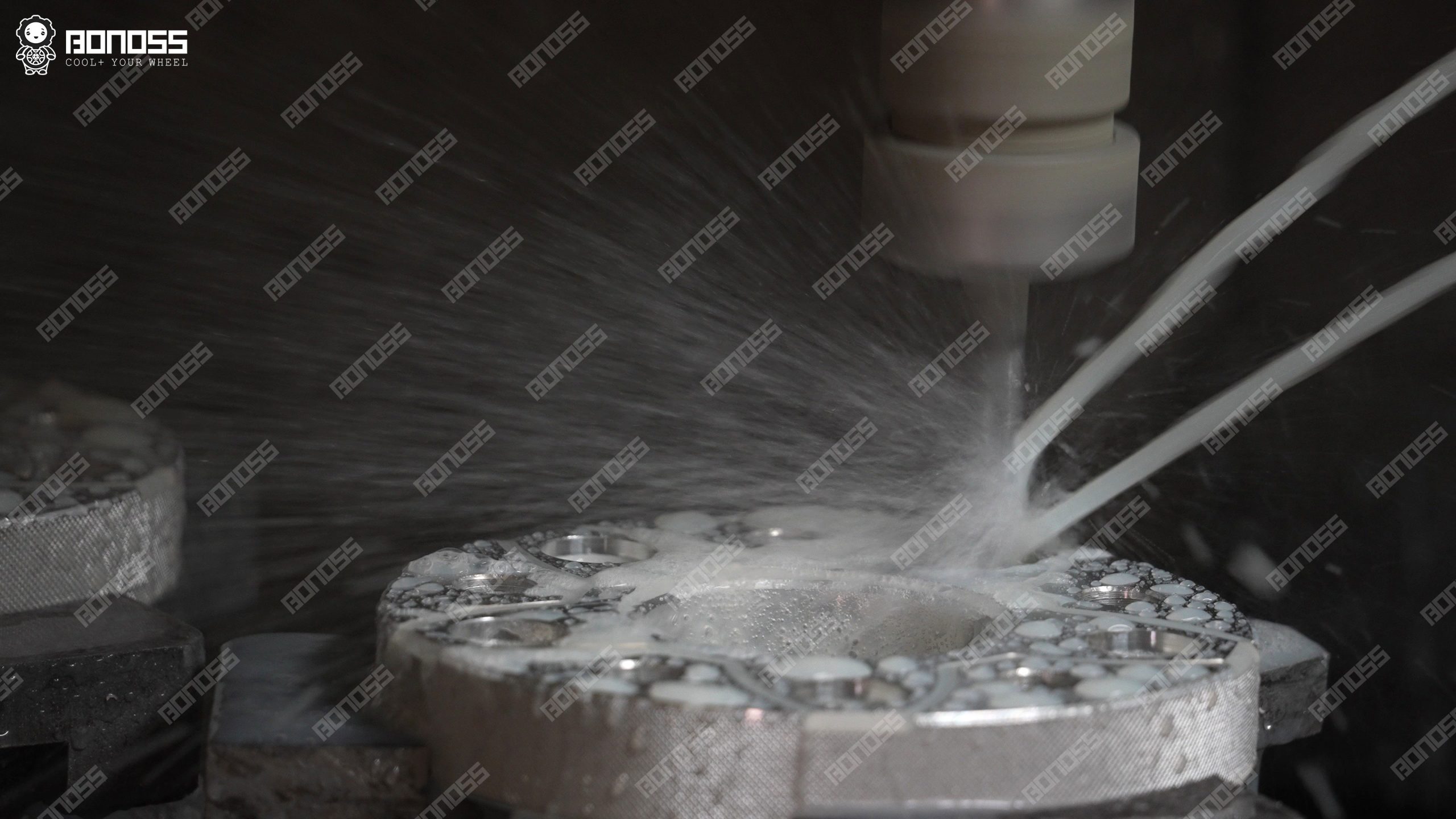 bonoss-cnc-machine-machining-spacer-for-2021-jeep-wrangler CNC equipment milling a forged aluminum wheel spacer blank at the BONOSS factory for Wrangler JL production.