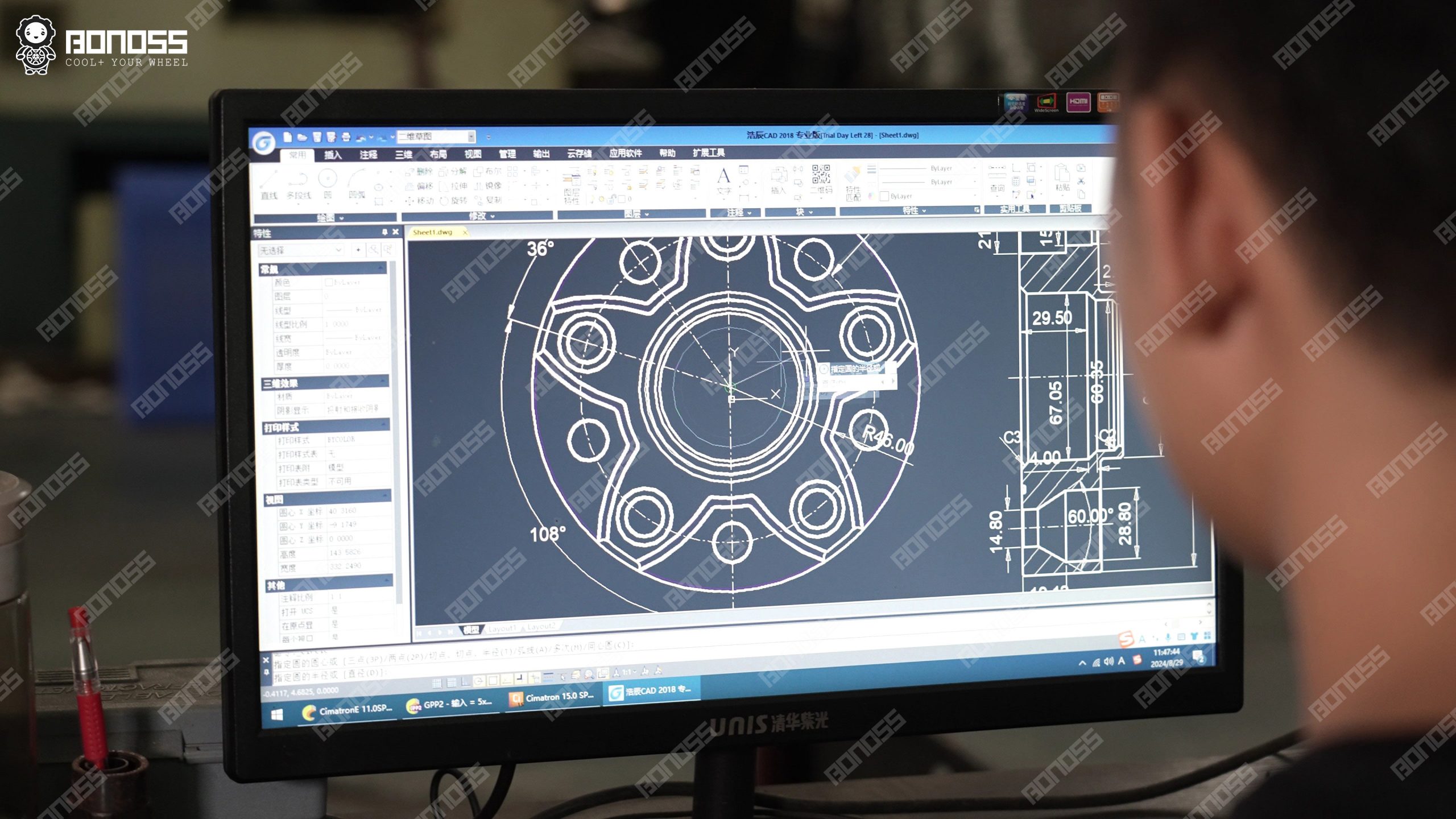bonoss-engineer-designs-spacer-model-for-jeep-wrangler-jl Engineer at a workstation finalizing CAD geometry for a 2021 Wrangler Rubicon wheel spacer inside the BONOSS facility.