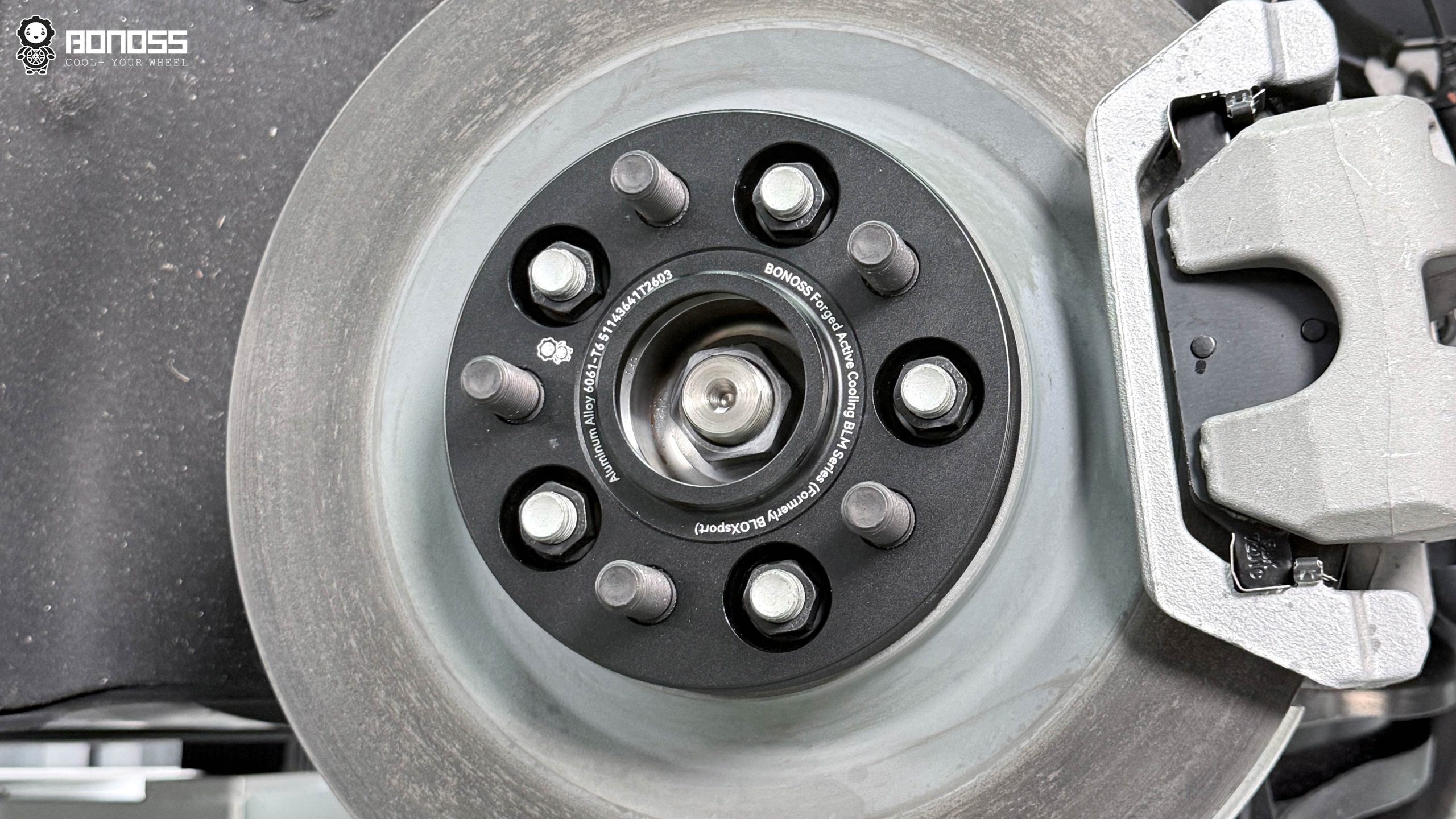 bonoss-hubcentric-wheel-spacer-installed-model-y-hub BONOSS hub-centric wheel spacer fully seated on the Tesla Model Y hub before wheel installation