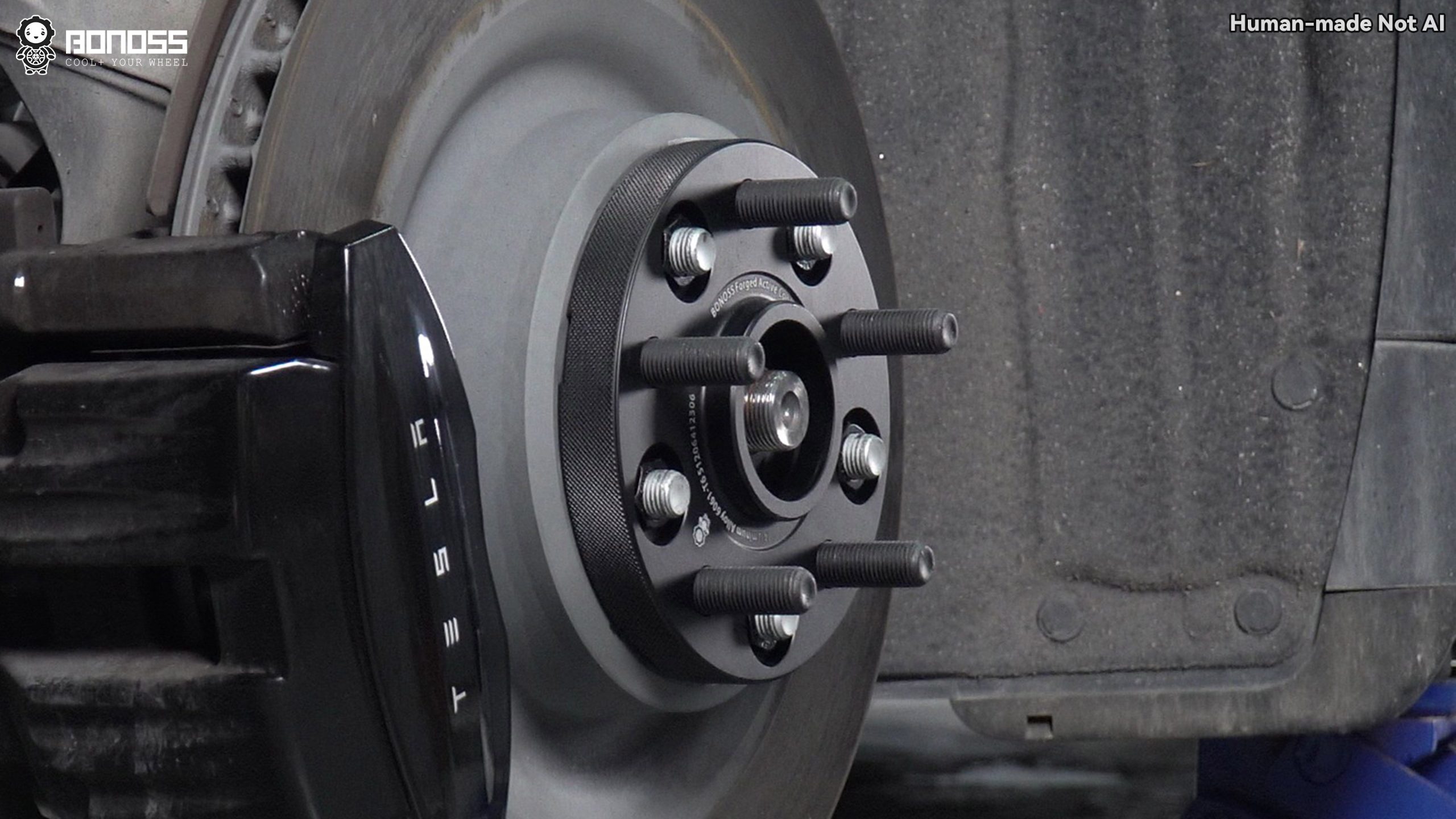 bonoss-spacer-mounted-on-rear-hub-of-2023-tesla-model-x 20mm hub-centric spacer mounted on the rear axle of a 2023 Tesla Model X.