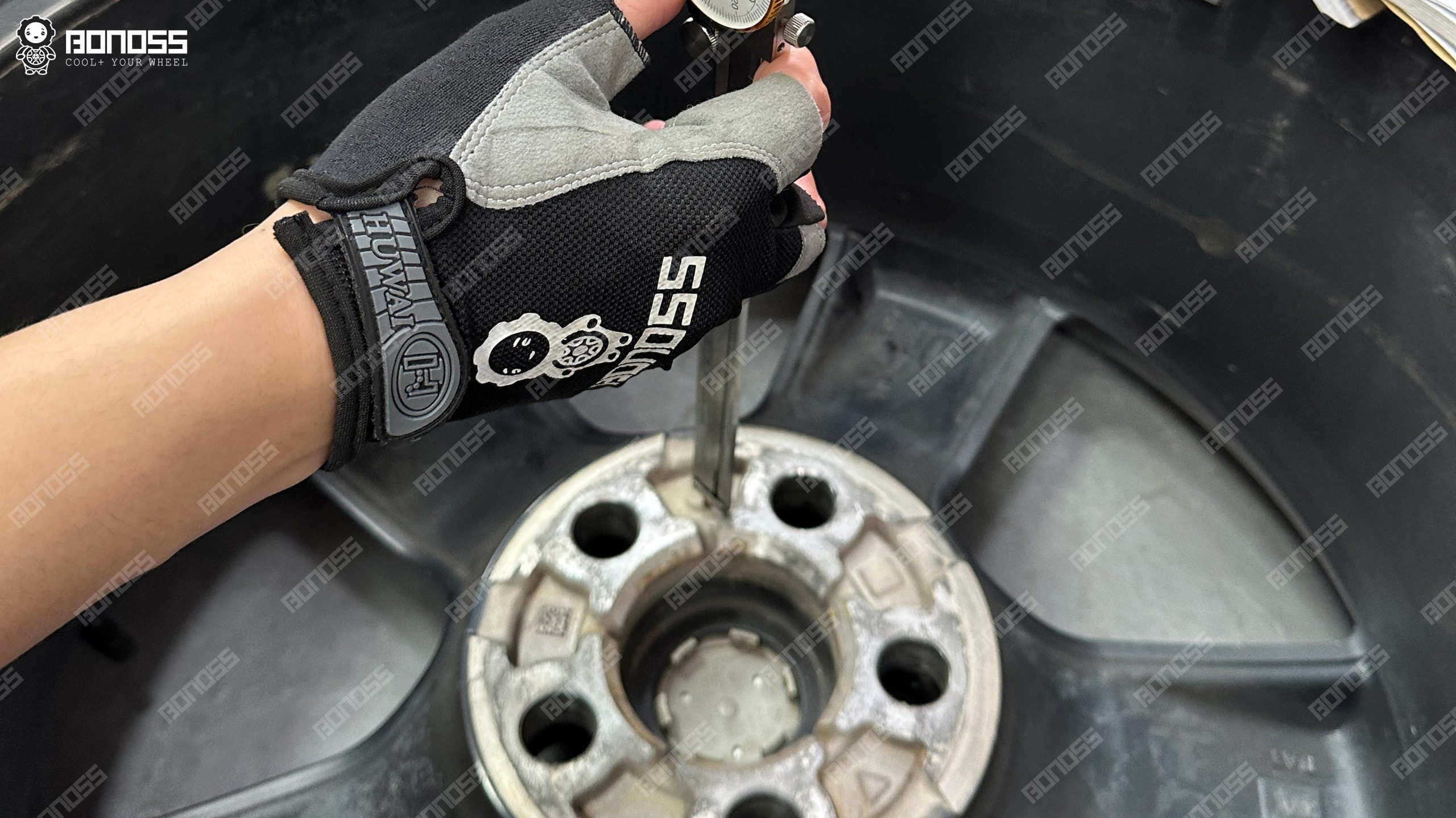 defender-l663-35mm-spacers-before-and-after-wheel-pocket-depth-caliper Instrument probes the wheel back recess to verify Defender L663 35mm spacers before and after clear the studs.