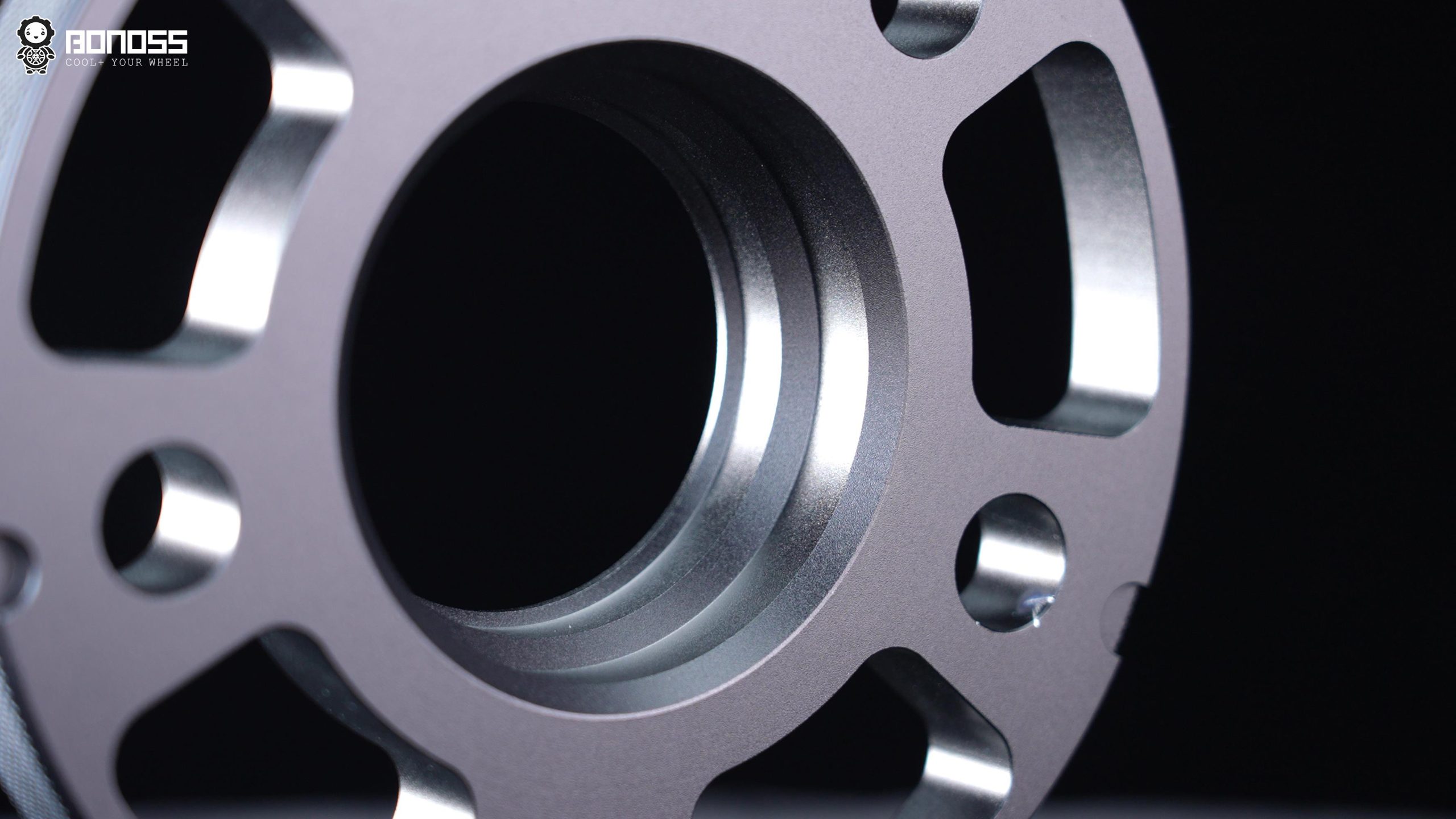 forged-lightweight-plus-w213-hub-centric-wheel-spacers-close-up Detailed view of the hub-centric lip and side knurling on BONOSS W213 hub-centric wheel spacers.