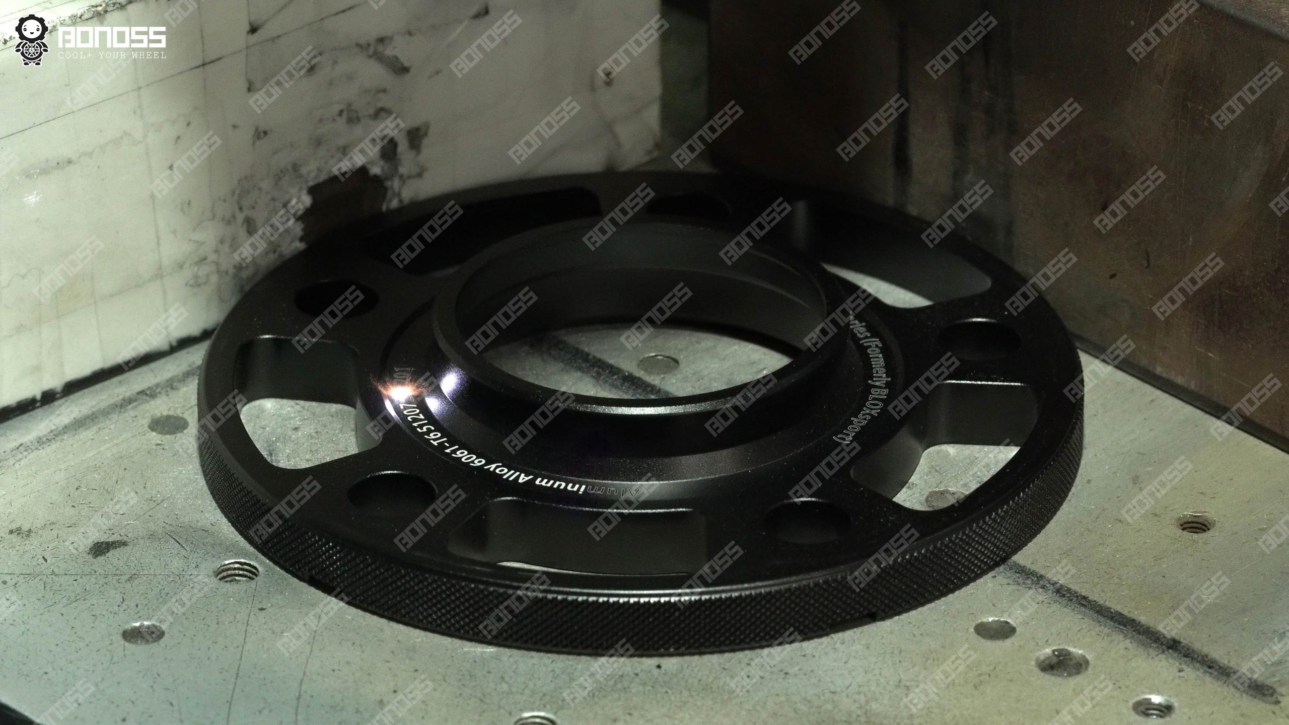 laser-engraving-lightweight-wheel-spacers-mercedes-w213-production Laser marking process on lightweight wheel spacers Mercedes W213 units during BONOSS production.