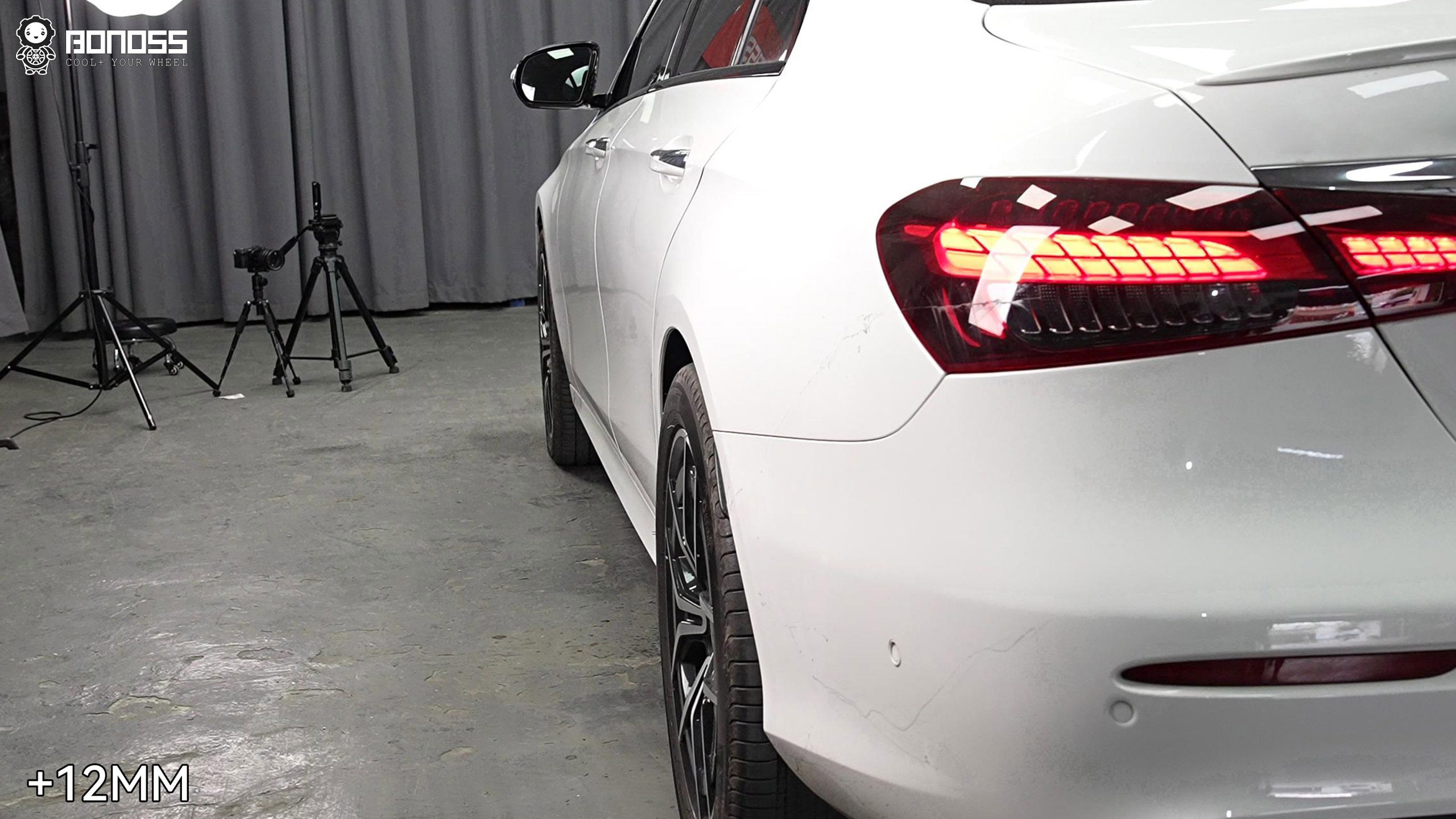 left-rear-flush-result-with-w213-15mm-front-12mm-rear-spacer-kit Left-rear wheel flush to the fender after installing a 12mm spacer on a 2021 Mercedes-Benz E-Class.