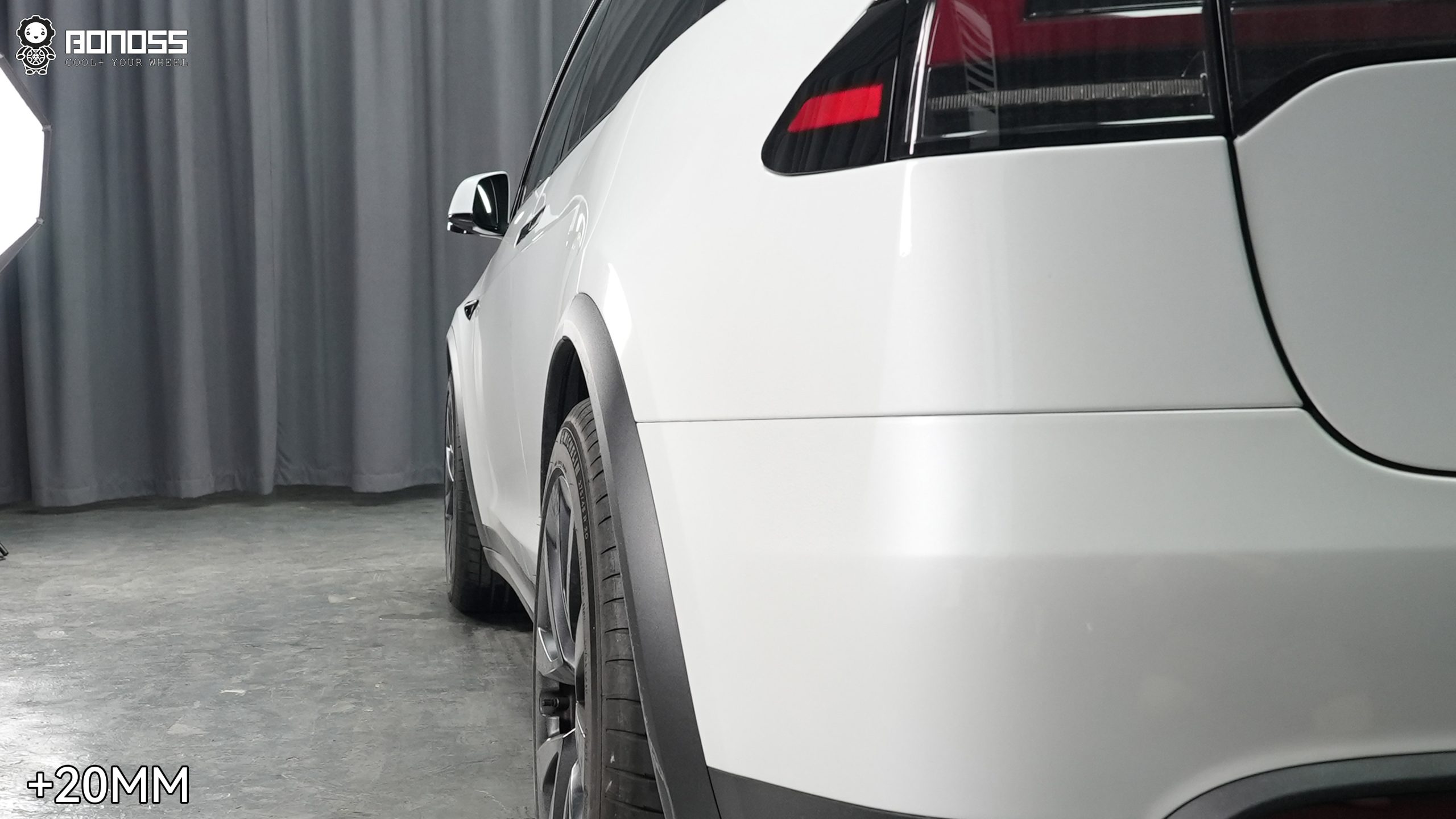 left-rear-wheel-of-2023-tesla-model-x-with-spacer-installed Left rear wheel sitting flush on a 2023 Tesla Model X with a 20mm spacer fitted.