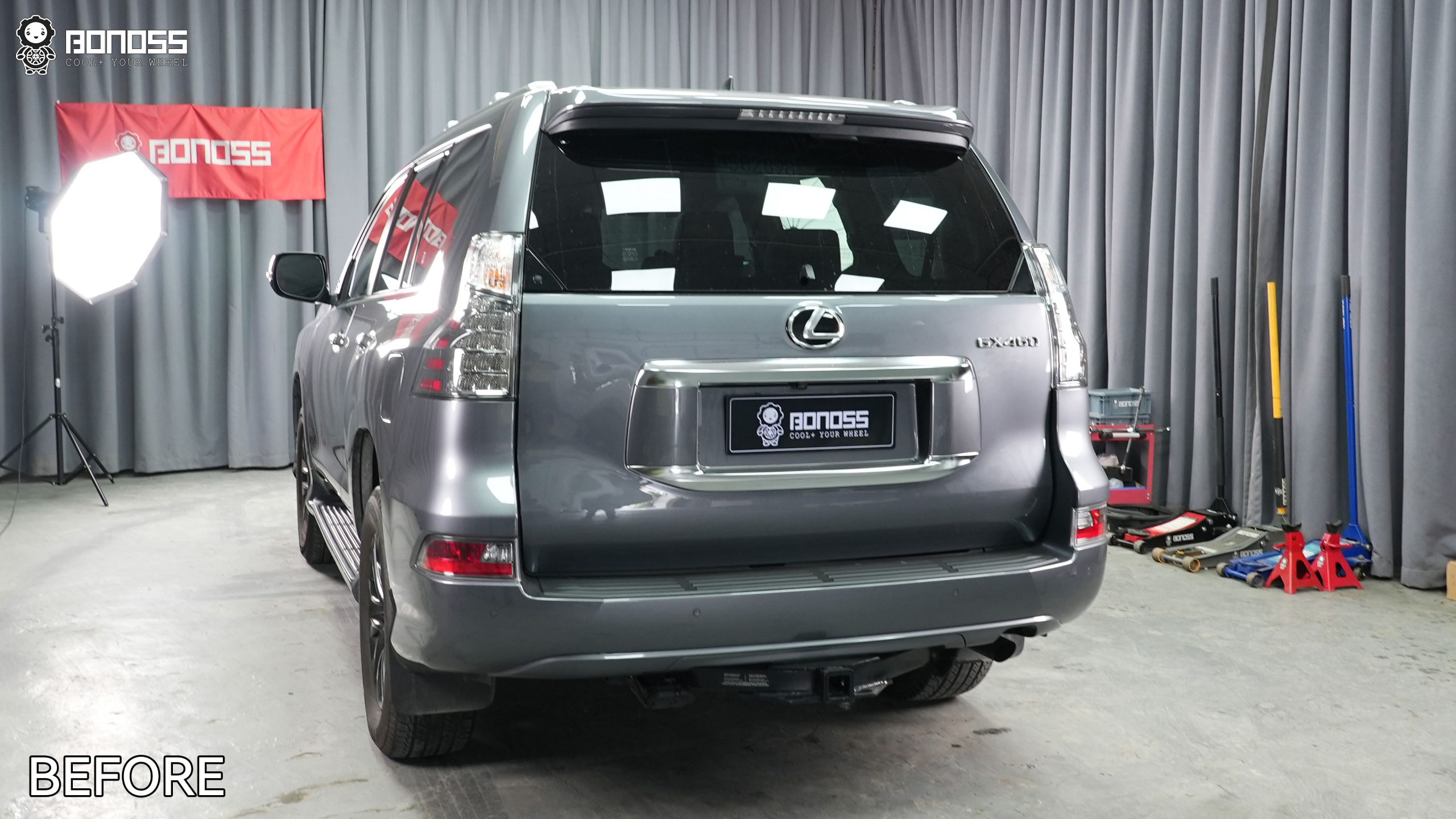 lexus-gx-470-rear-stance-before-spacers Full rear quarter view of a stock Lexus GX 470 displaying the factory wheel inset prior to any modifications.