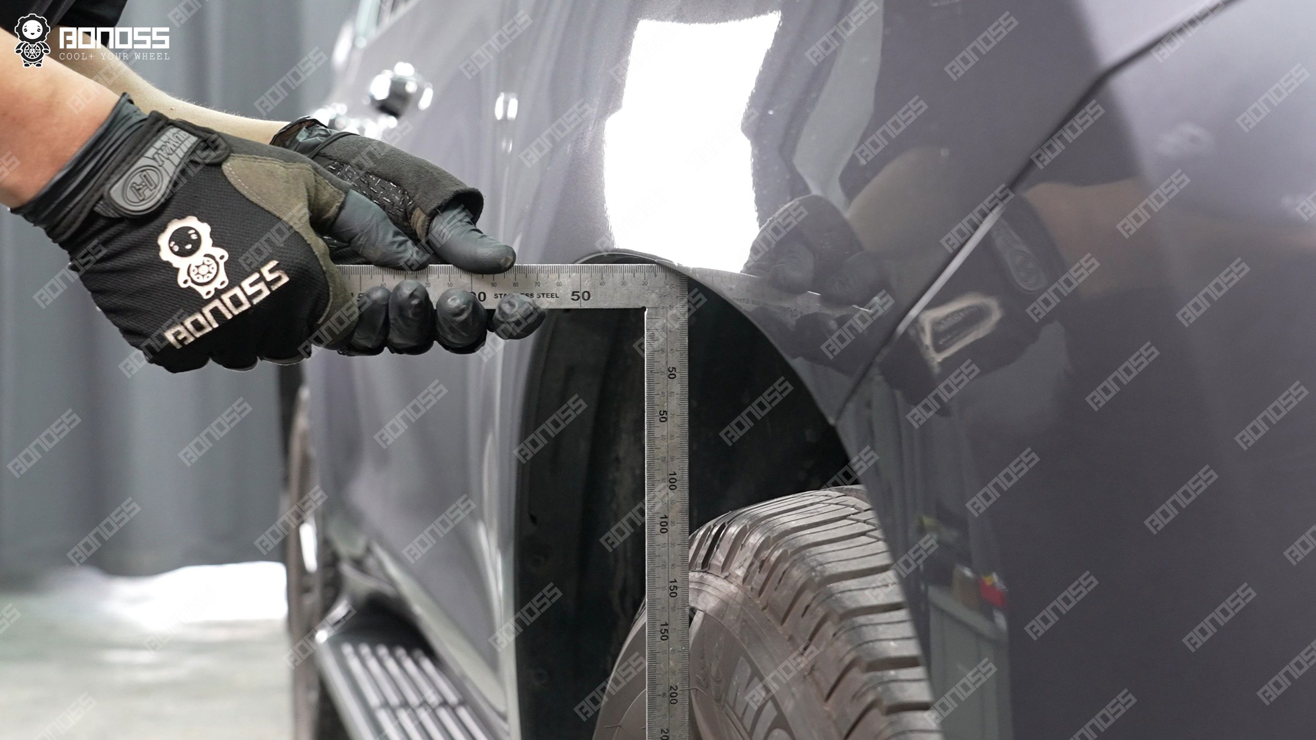 lexus-gx-flush-measurement-ruler-fender-gap Measuring fender clearance with a precision ruler to calculate correct Lexus GX wheel spacer size for a flush stance.