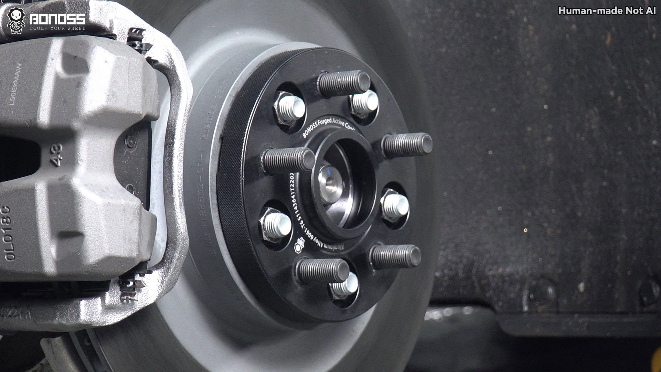 model-3-18mm-wheel-spacers-rear-hub-mounted-view Rear-hub mounting position of Model 3 18mm wheel spacers before the wheel is refitted.